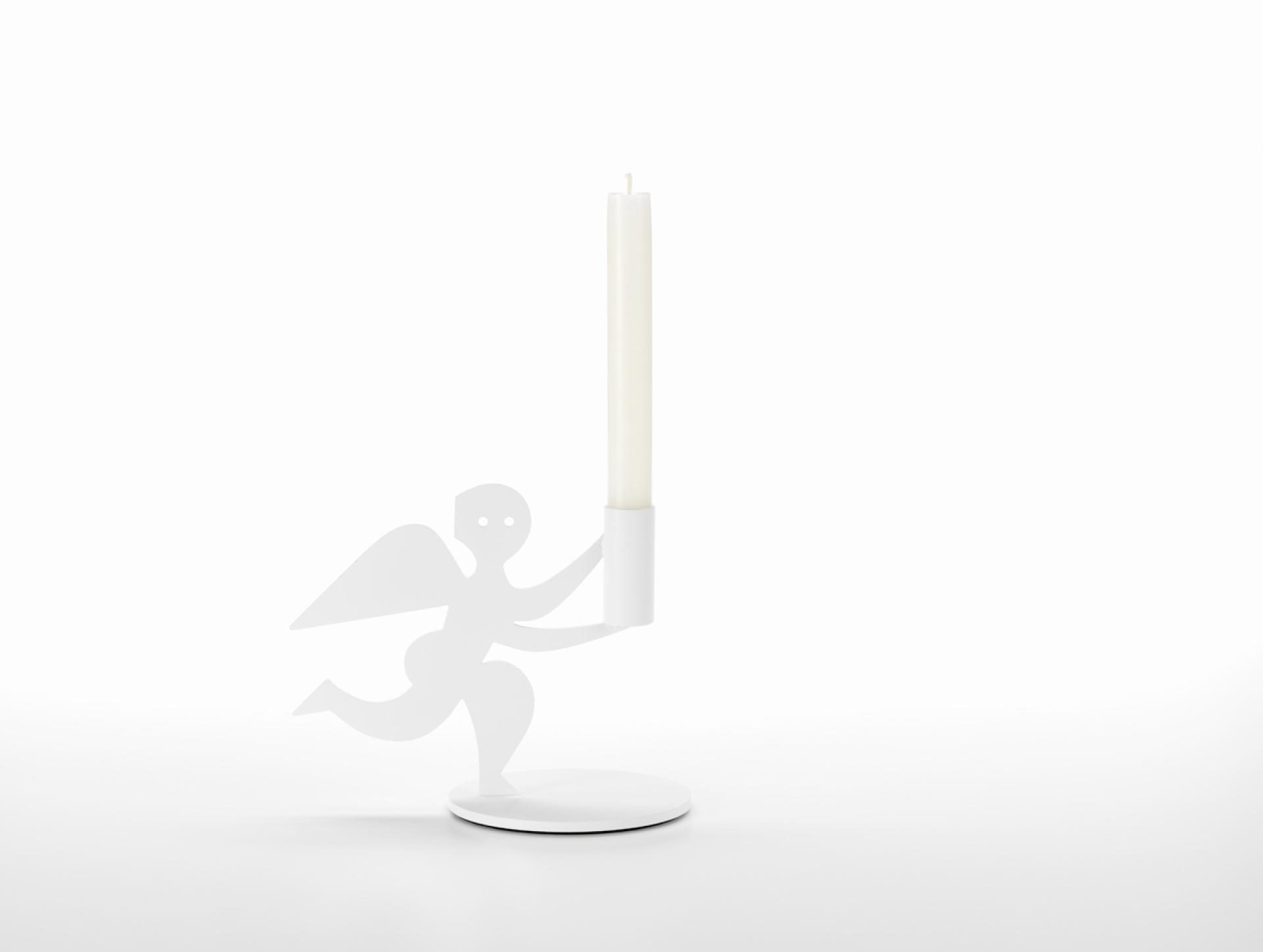 White candleholder designed by Alexander Girard featuring an angel figure, part of Vitra's autumn/winter accessories collection.
