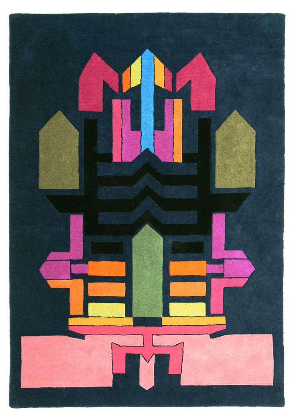 Bold, geometric rug design featuring vibrant colors, showcasing traditional textile art in collaboration with Paul Smith.