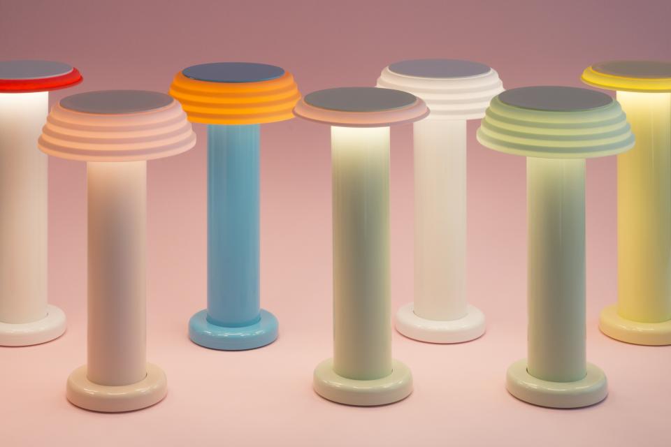 Colorful lamps from the SowdenLight SHADES collection, showcasing various configurations against a soft pink background.