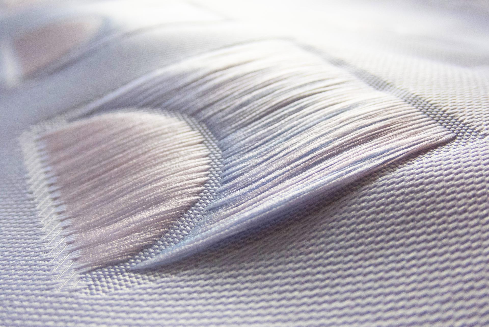 Textured surface detail showcasing biotechnologies in interior design, enhancing sensory experiences for restorative spaces.