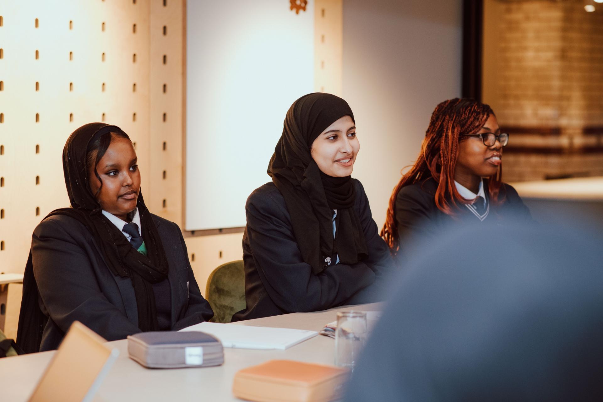 Students from Manchester Academy engaged in creative discussions about interior design at SCENE Interiors.