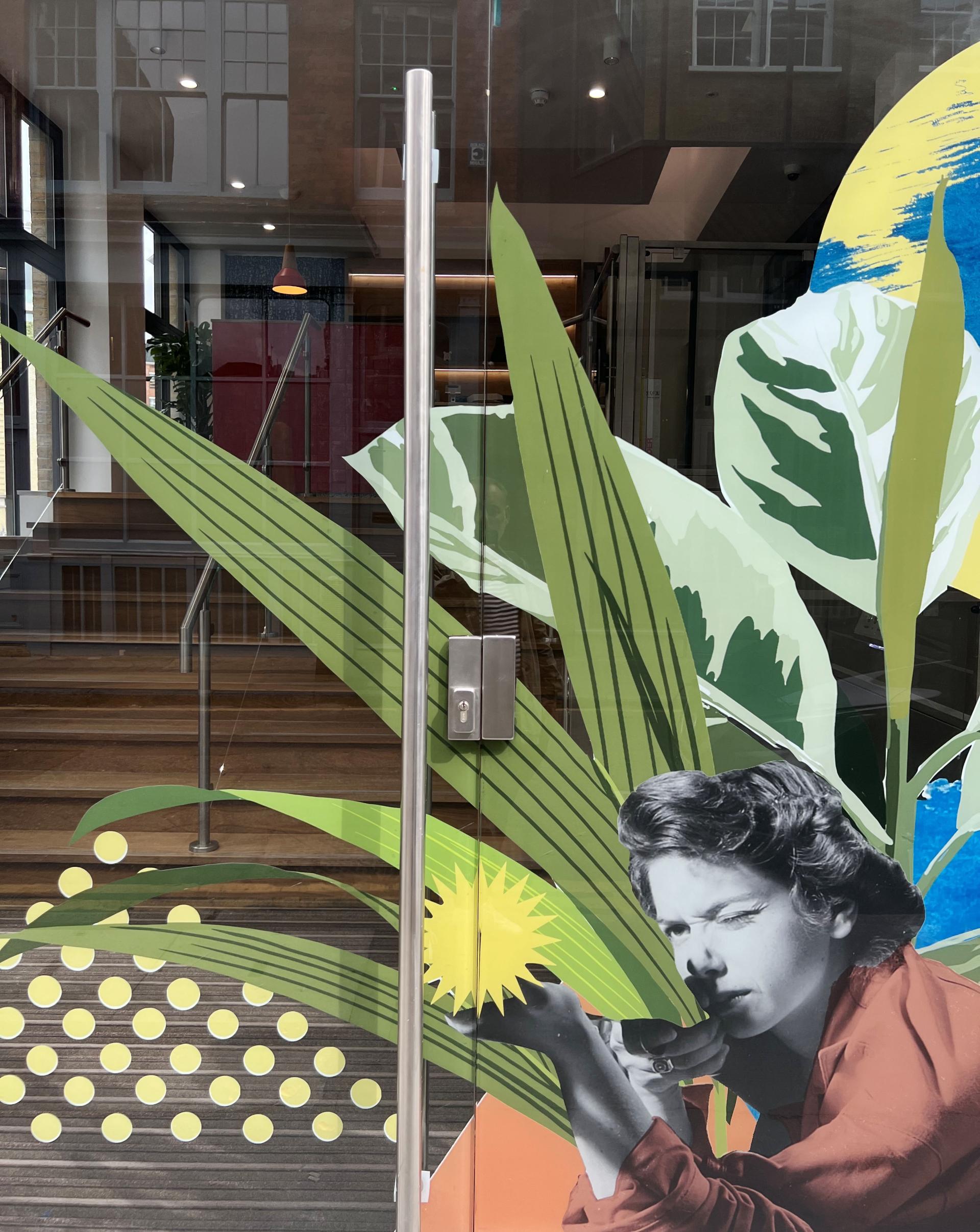 Vibrant mural featuring a woman among colorful leaves and patterns, showcasing Sheila Bird Studio's artistic collaboration with Runway East.