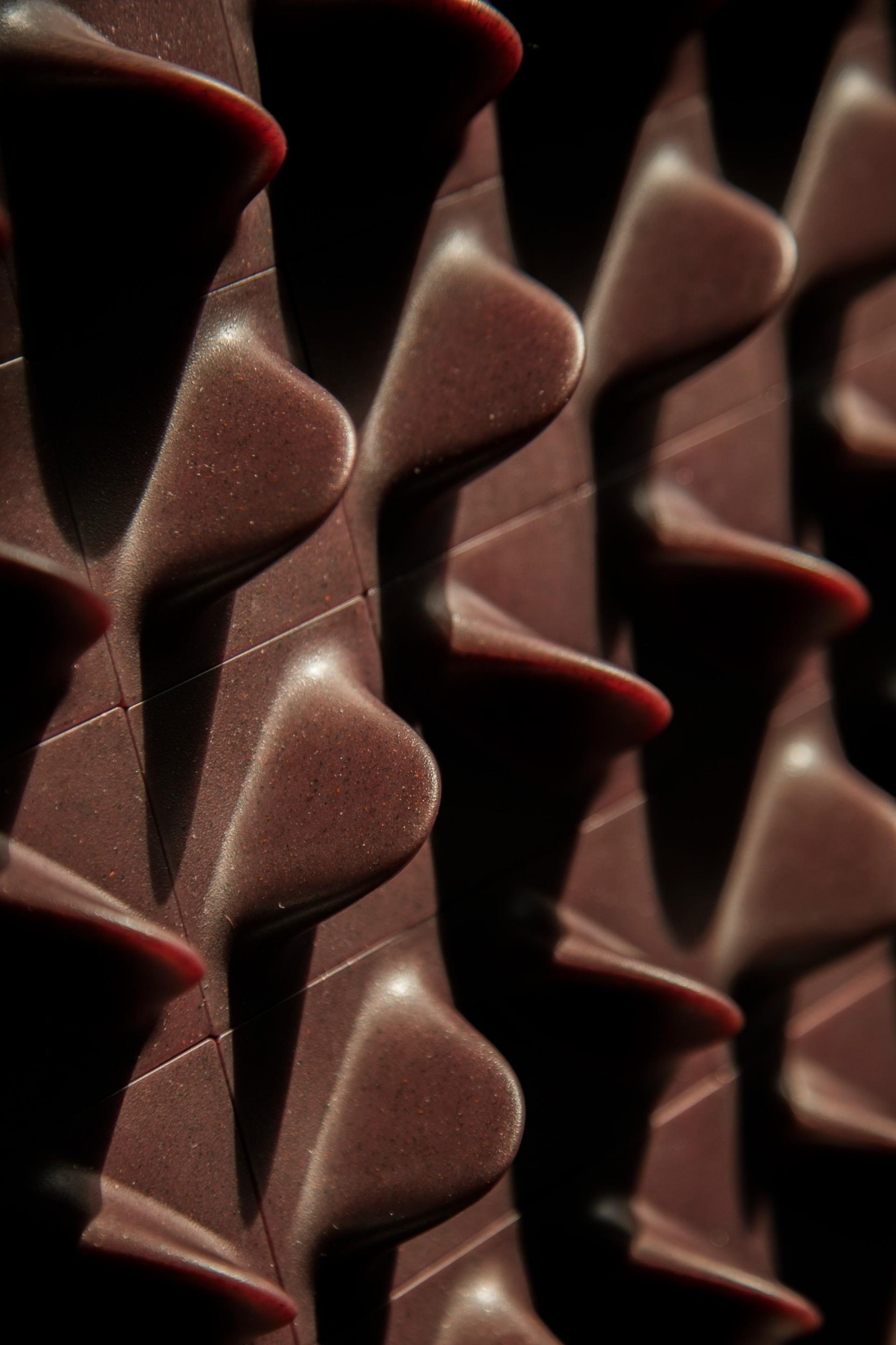 Textured materials showcase innovative design, highlighting the interplay of light and shadow in contemporary architecture.