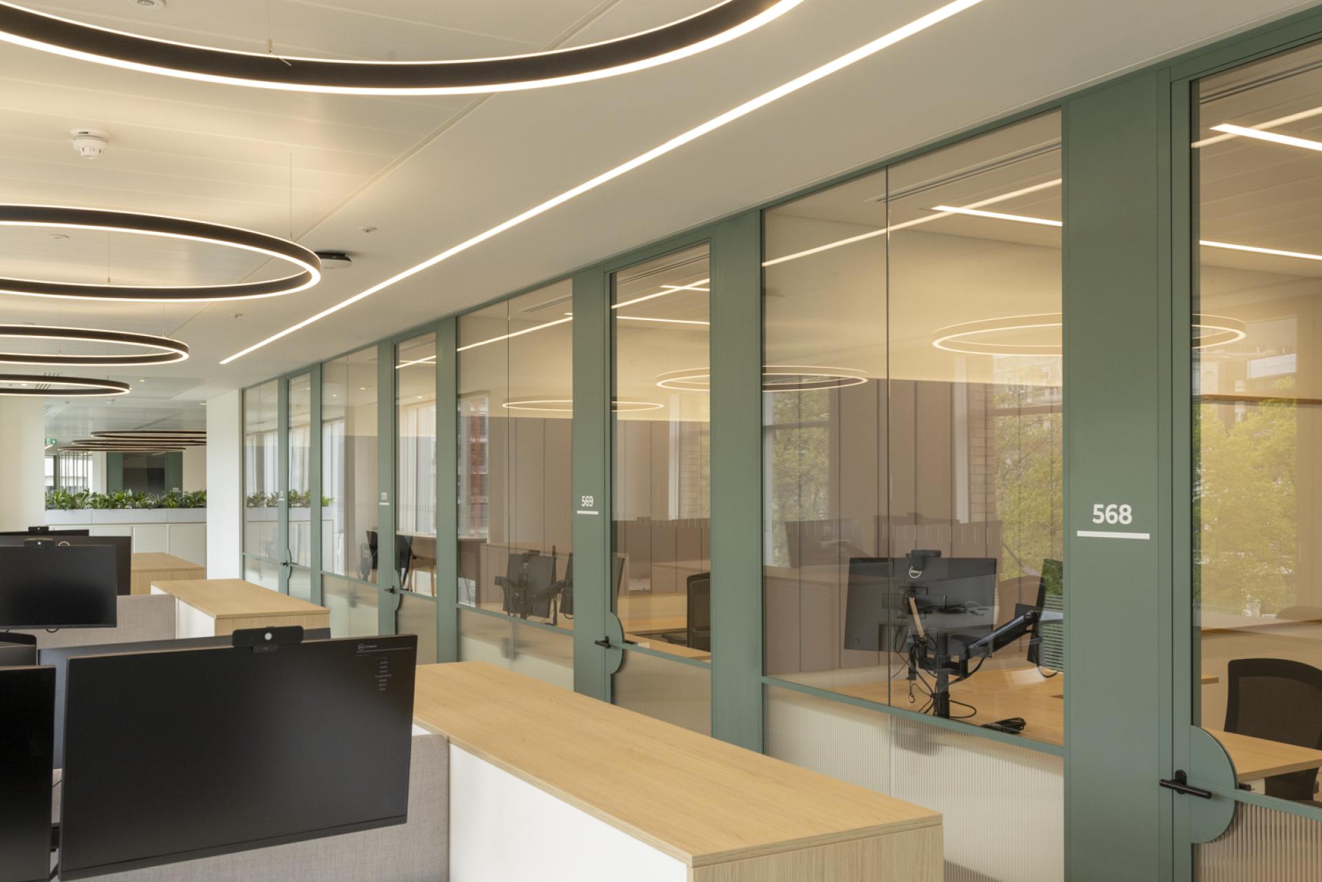 Bespoke door designs and high-end office partitions by Radii for Goodwin Procter.