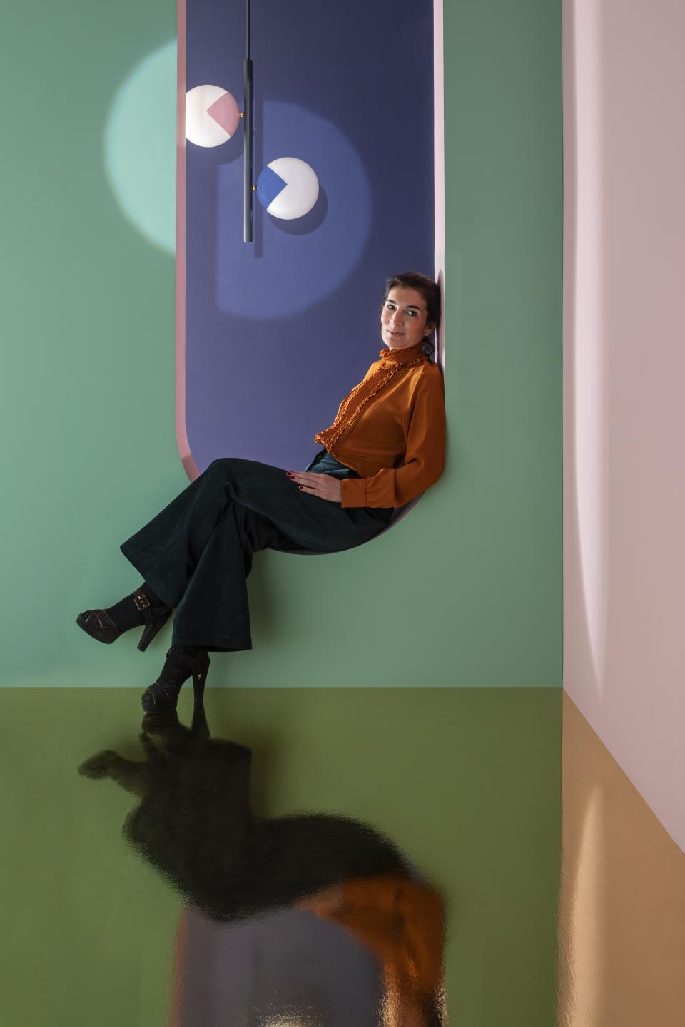 Colorful 'eyeball' lamps from Magic Circus Éditions displayed in a modern, stylish interior setting with vibrant hues.