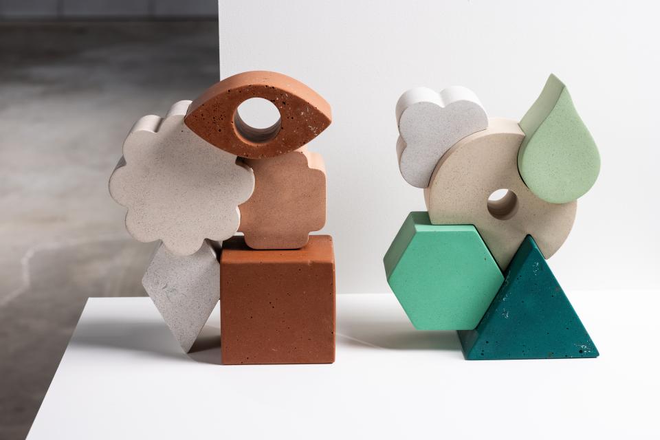 Colorful geometric sculptures made from reused materials, highlighting innovative design at Dundee Design Festival 2024.