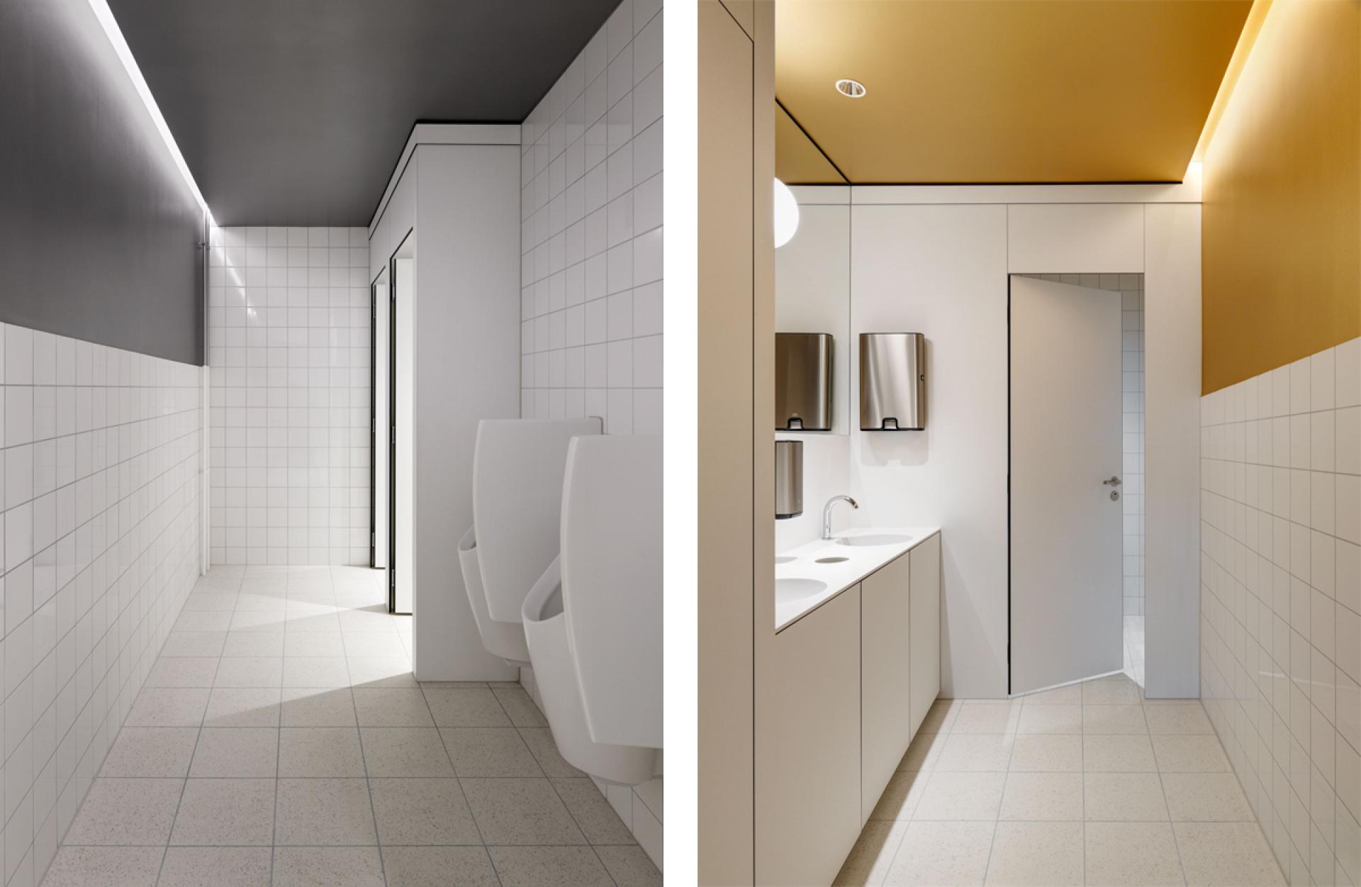 Modern bathroom design showcasing sleek fixtures, minimalist white tiles, and contrasting ceiling colors by Studio Gessaga for Ferrum AG.