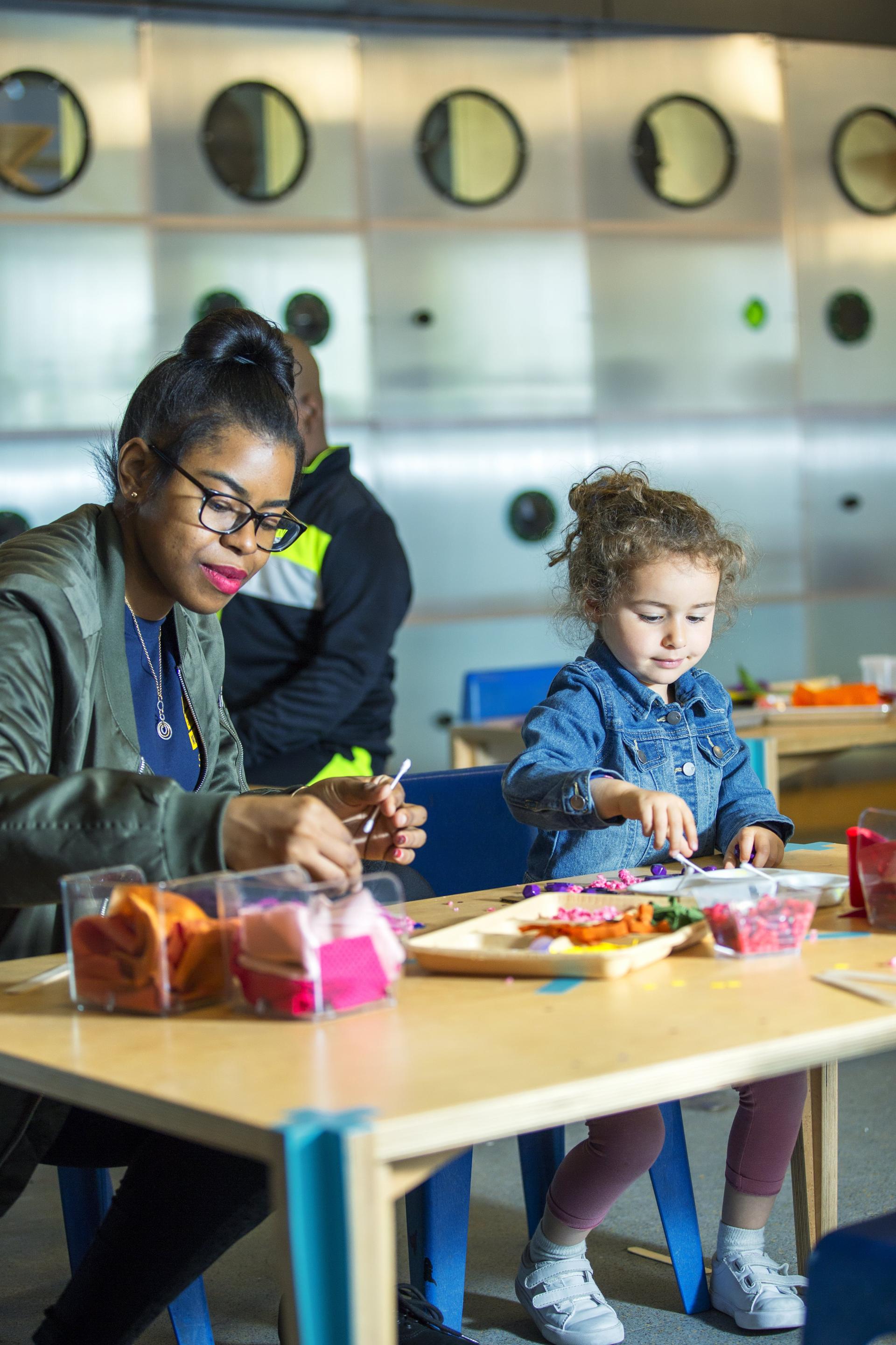 Children engage in creative art activities at ColorLab, an innovative art-making space in Brooklyn designed for young learners.