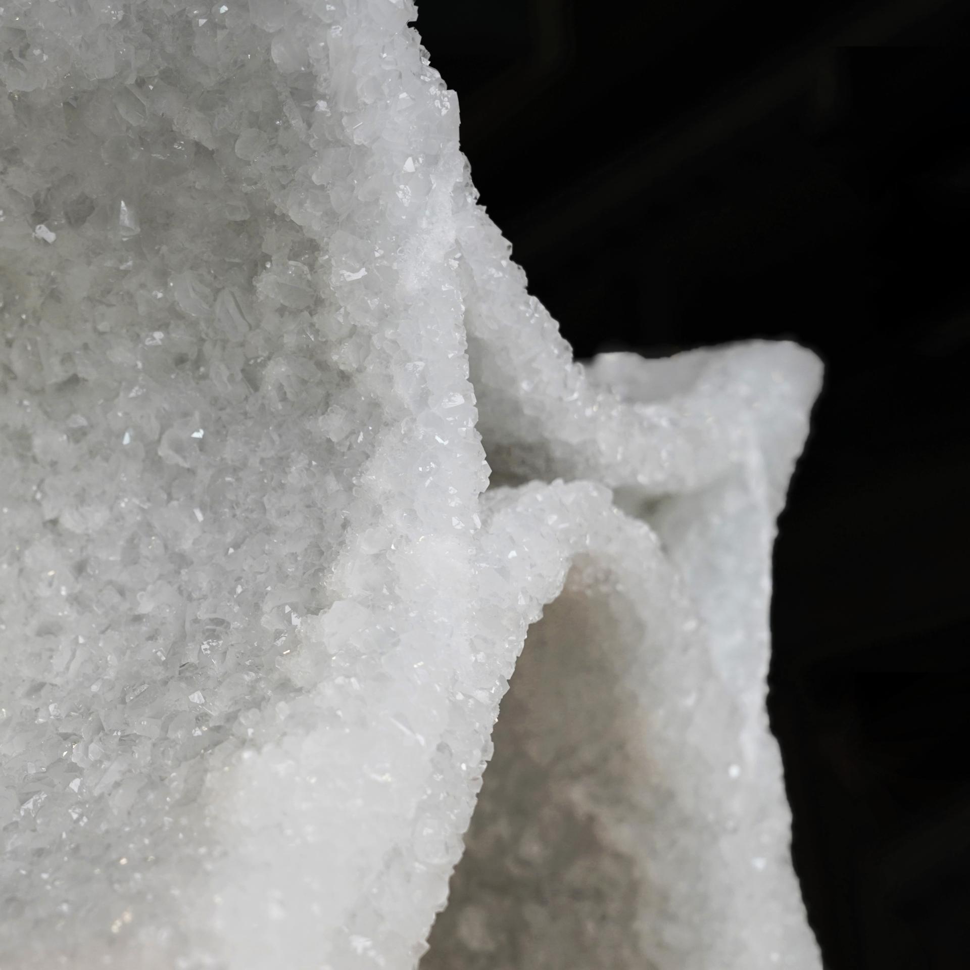 Natural crystal formation with a textured, shimmering surface, showcasing materials featured at New Designers 2024.