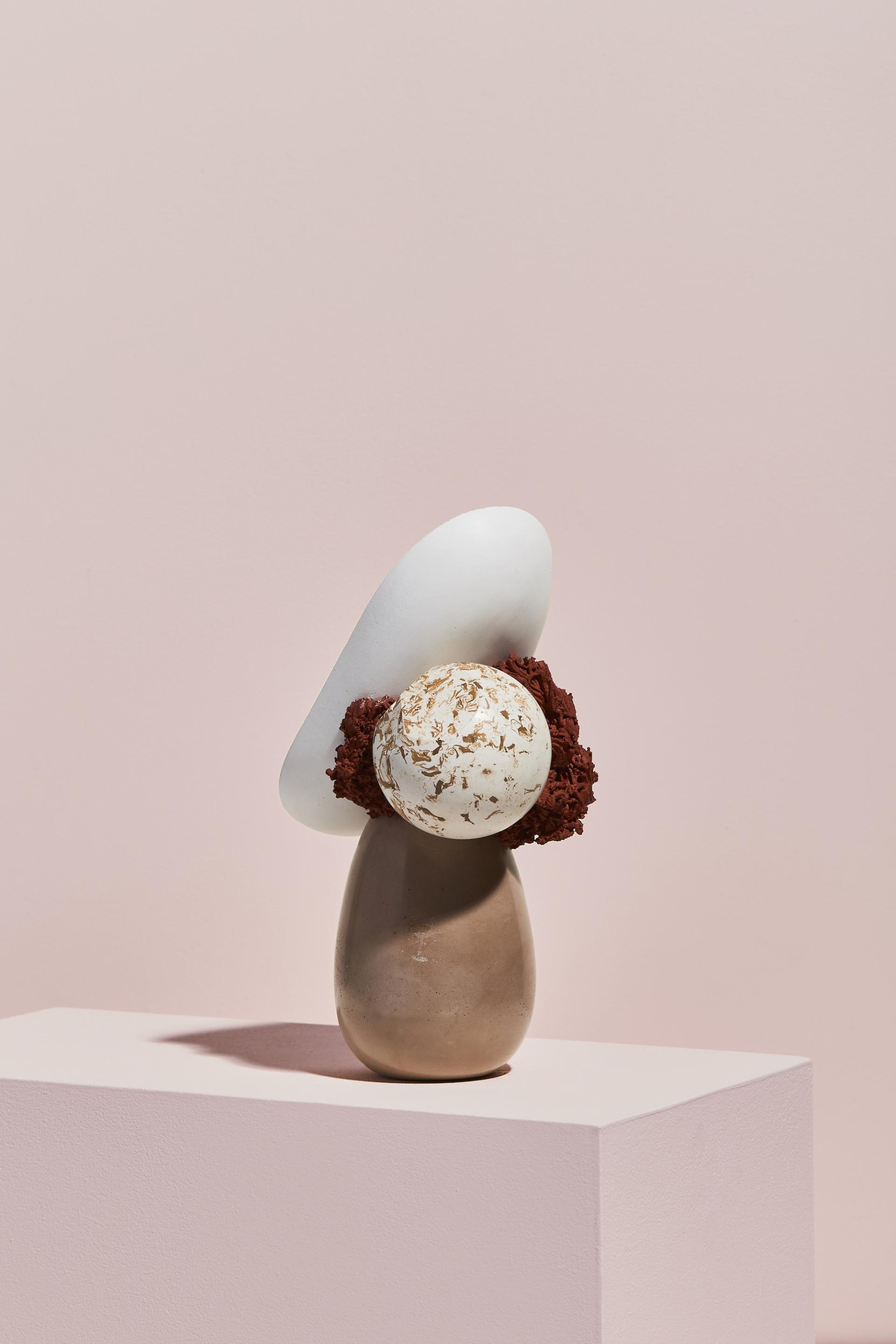 Abstract sculpture featuring layered shapes in neutral tones, showcasing ceramic artistry by maker Vic Wright, highlighted in the NOMA residence program.