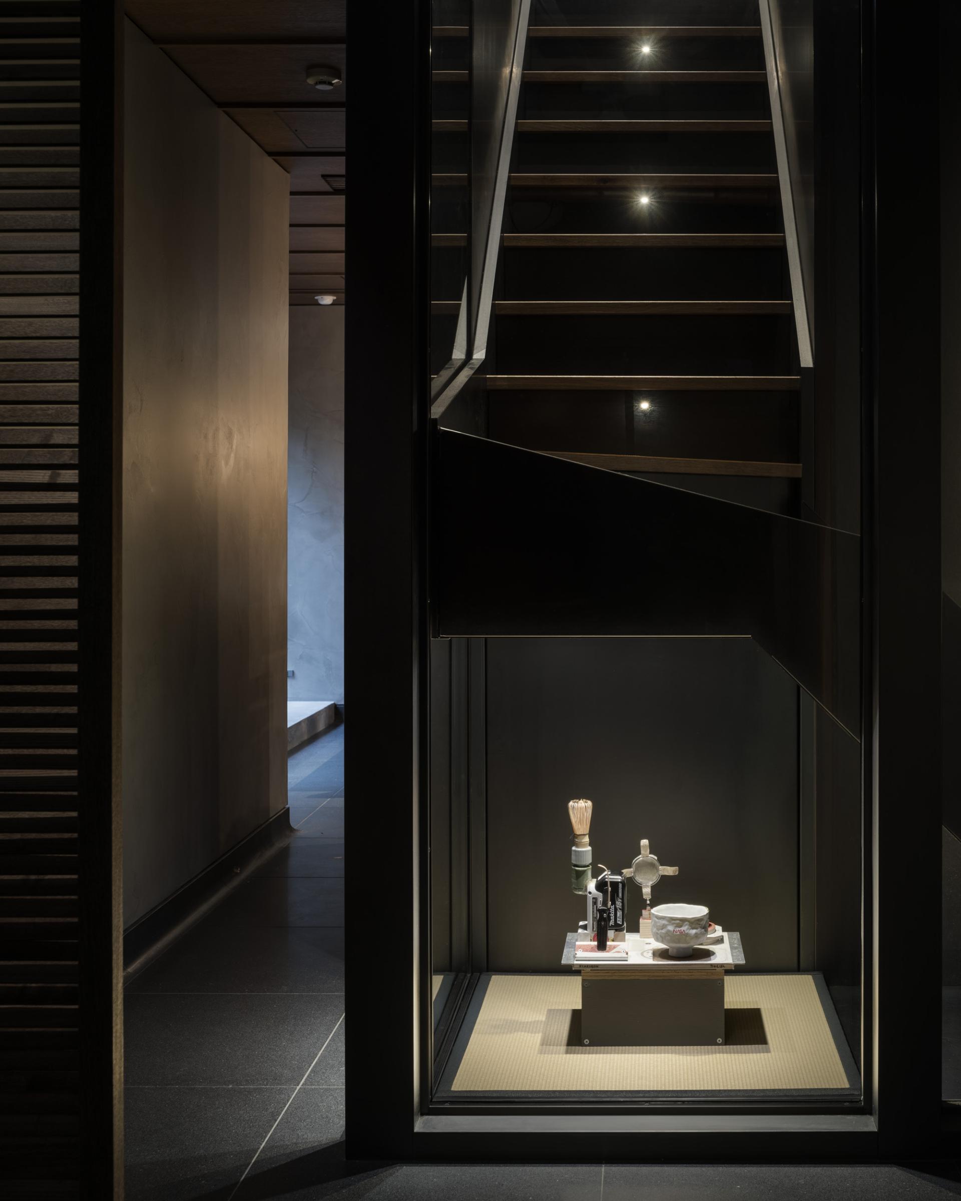 Elegant interior shot of TRUNK(HOUSE) showcasing minimalist design and unique decor elements, highlighting Tokyo's Kagurazaka neighborhood.