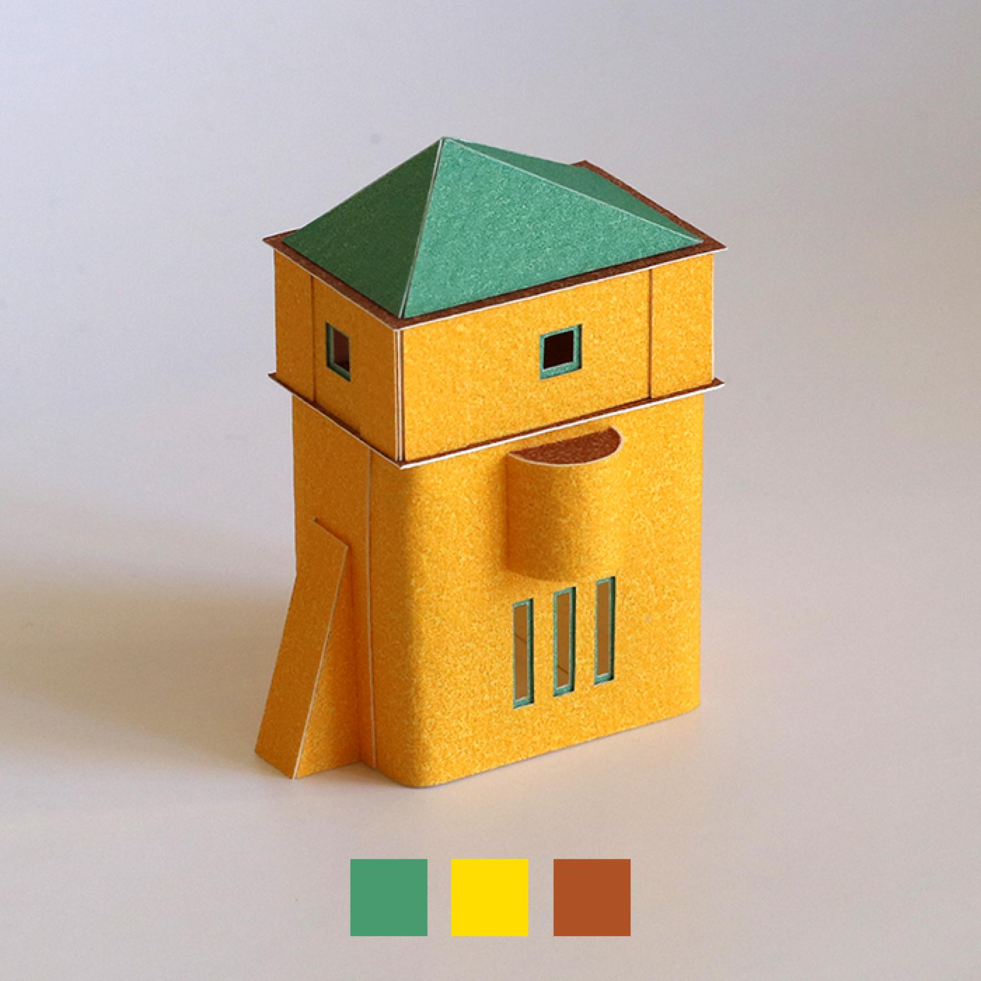 Colorful miniature paper model of a building designed by storyteller Charles Young, showcasing intricate architectural details.