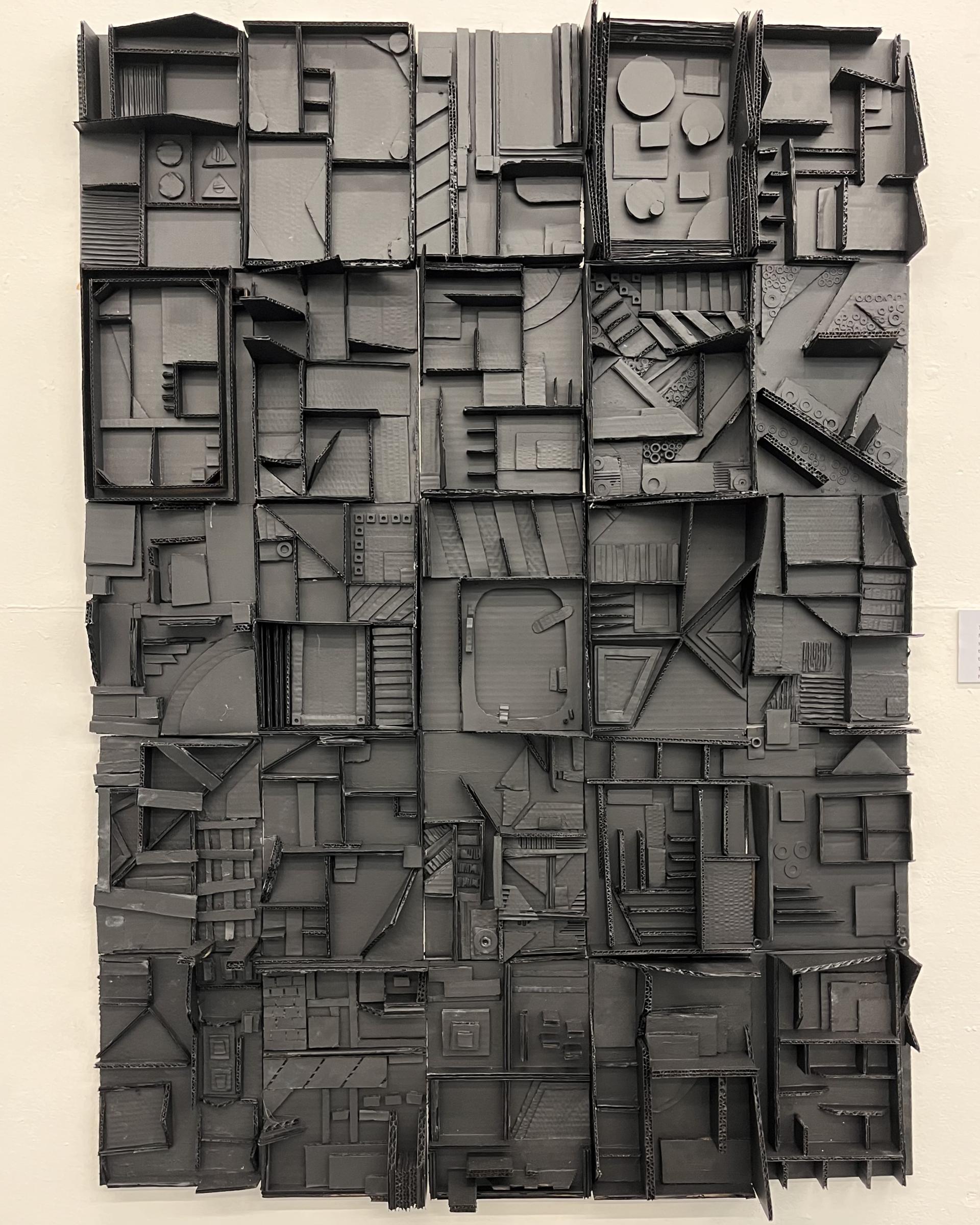 Sculptural artwork made from reimagined plastic waste, featuring intricate geometric patterns and textures, highlighting sustainability initiatives.