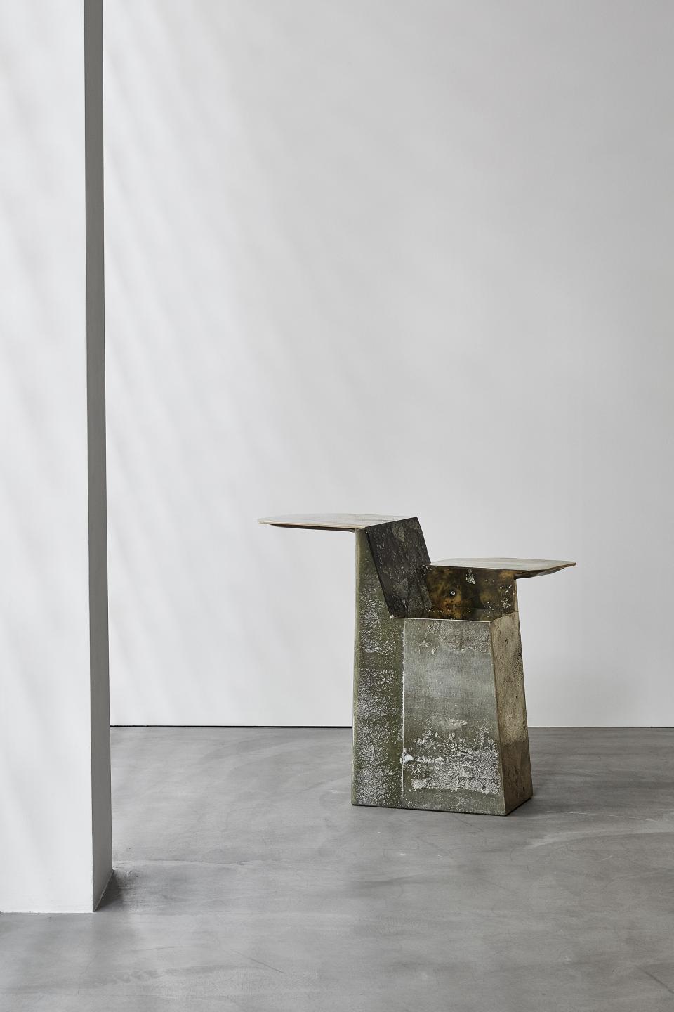 Sculptural concrete chair by Vincenzo de Cotiis, showcasing unique design and opulent materials for En Plein Air exhibition.