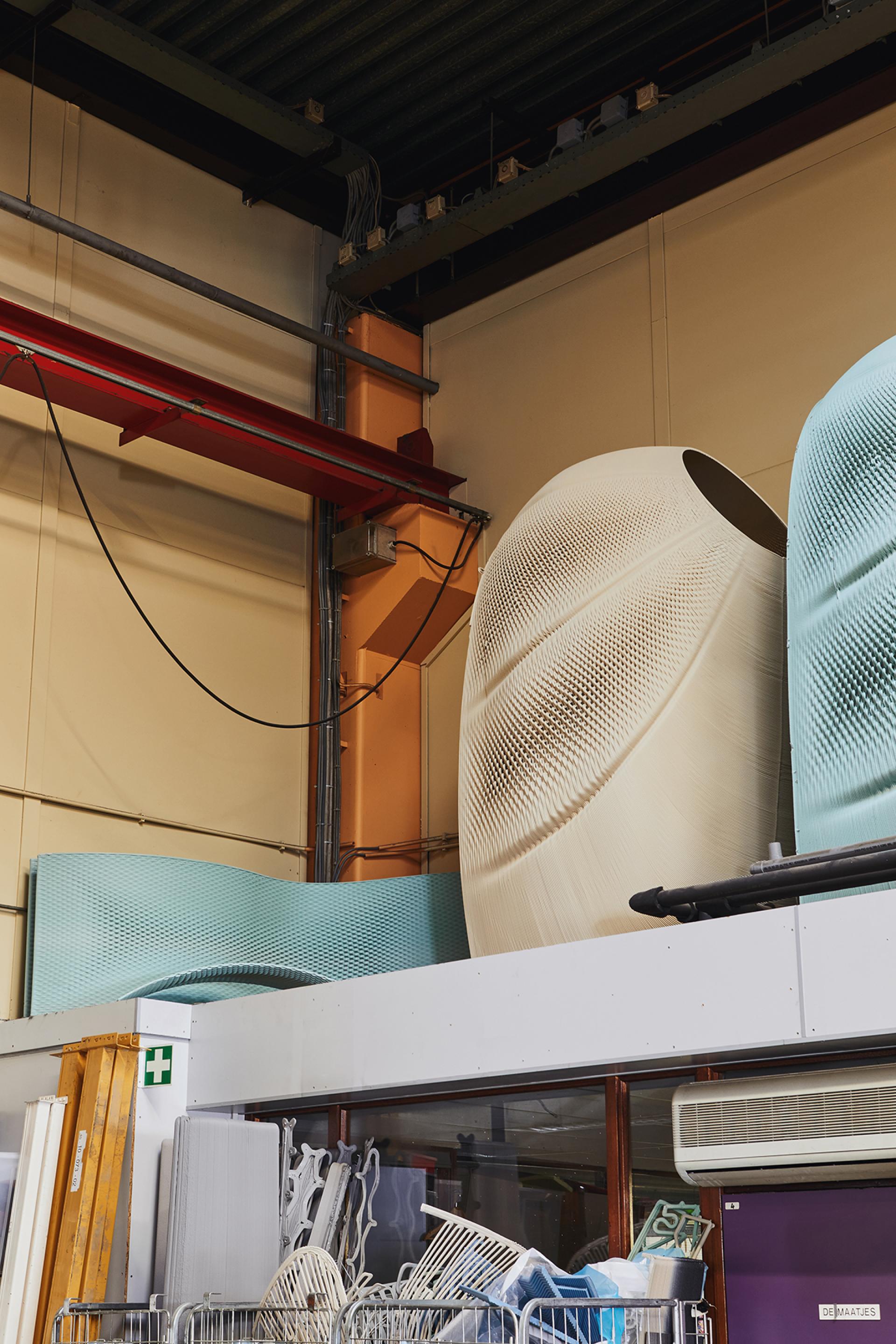 Ermis chair prototypes showcase innovative zero waste design in a modern studio environment, highlighting sustainable furniture craftsmanship.