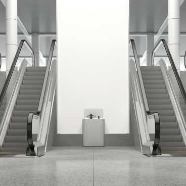 Modern washpod installation between escalators in a public space, emphasizing hygiene and design by CDUK.