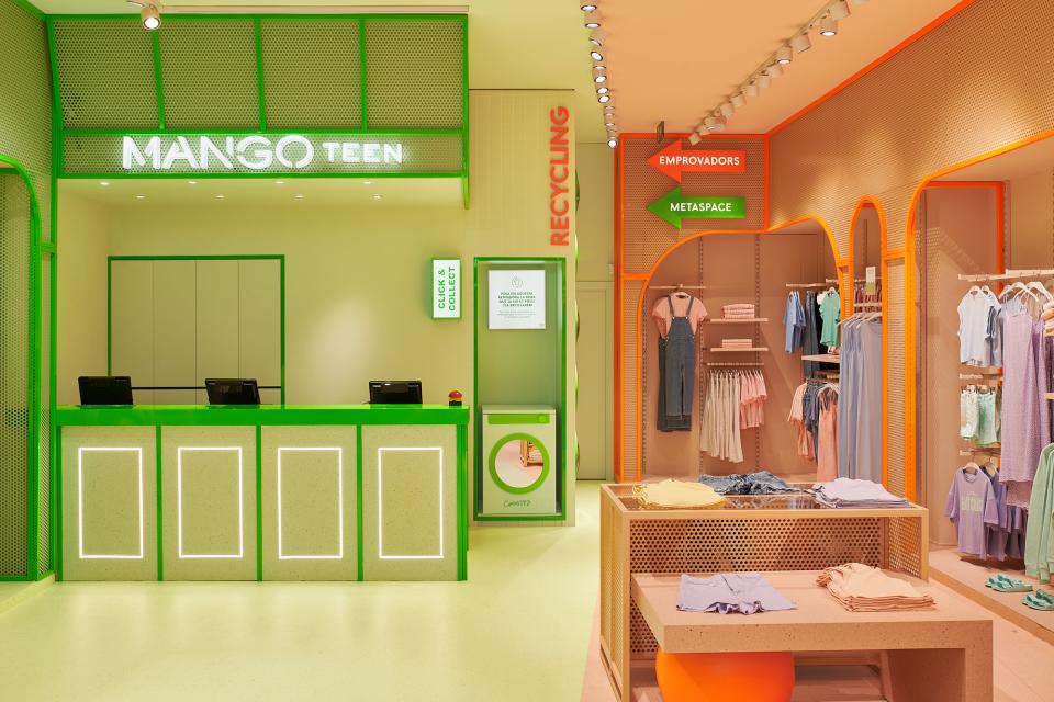 Brightly designed Mango Teen store interior featuring citrus colors, display racks, and a modern service counter in Barcelona.