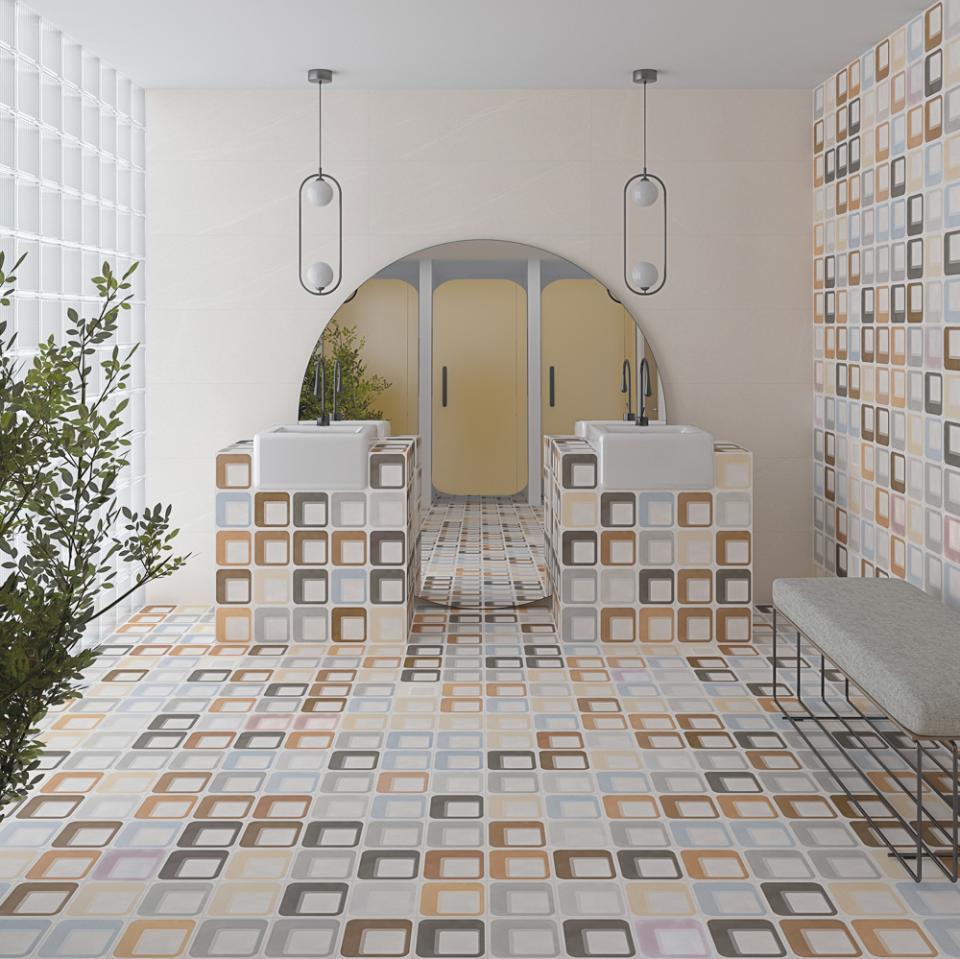 Contemporary bathroom featuring colorful patterned tiles, stylish sinks, and modern lighting, highlighting Tile of Spain's design trends.