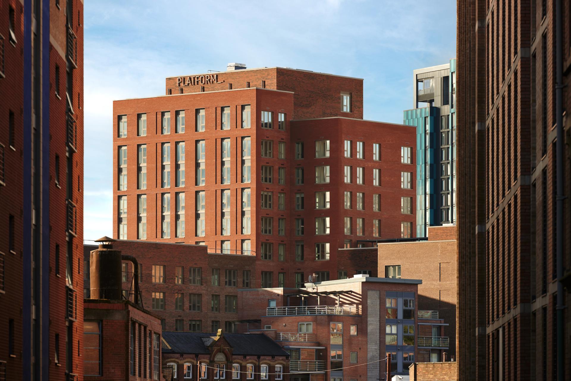 Modern brick buildings in Sheffield, showcasing the collaboration between Karndean Commercial and PLATFORM_ in rental development.