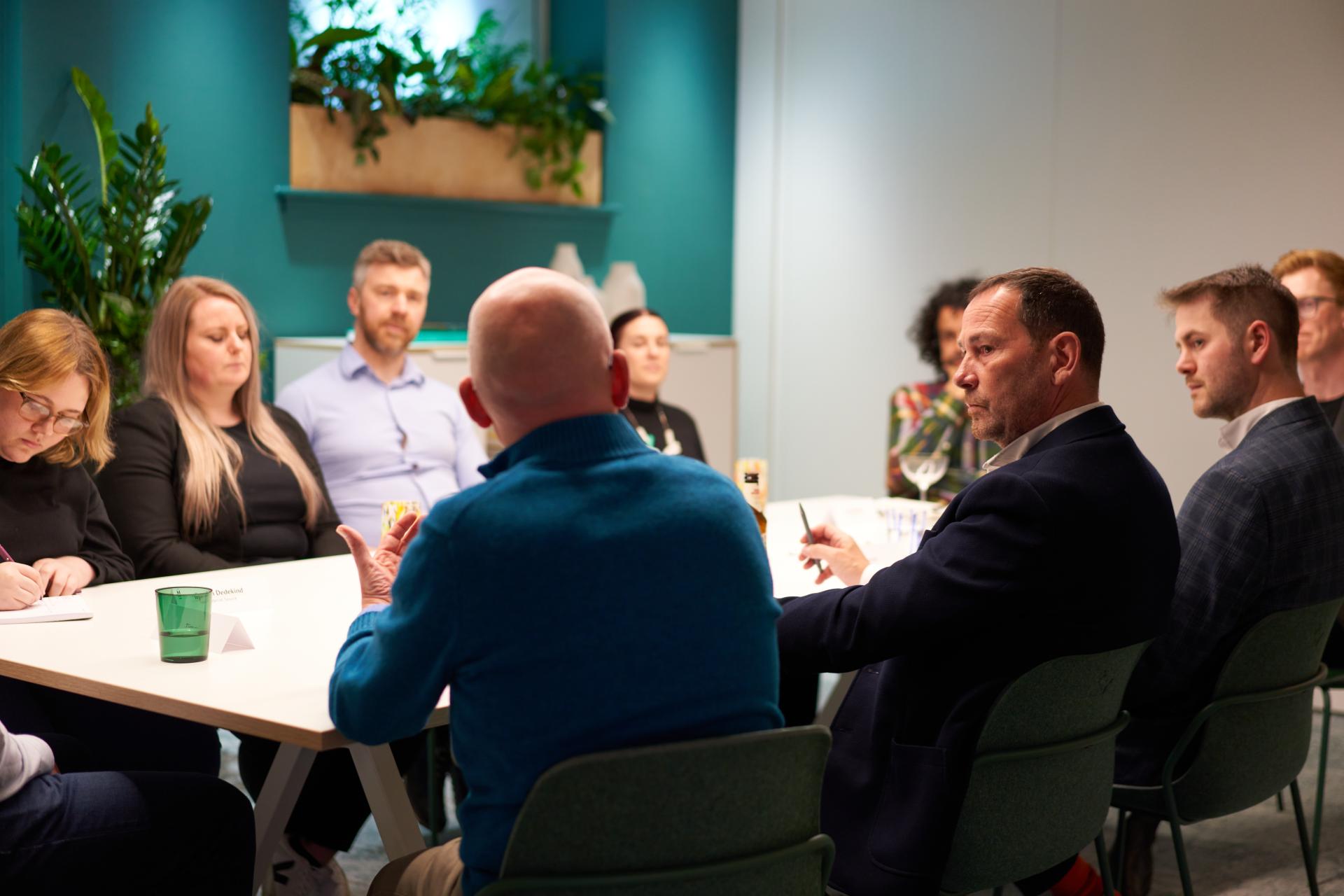 Discussion panel at Material Source Studio, focusing on Glasgow's residential property mix and community engagement.