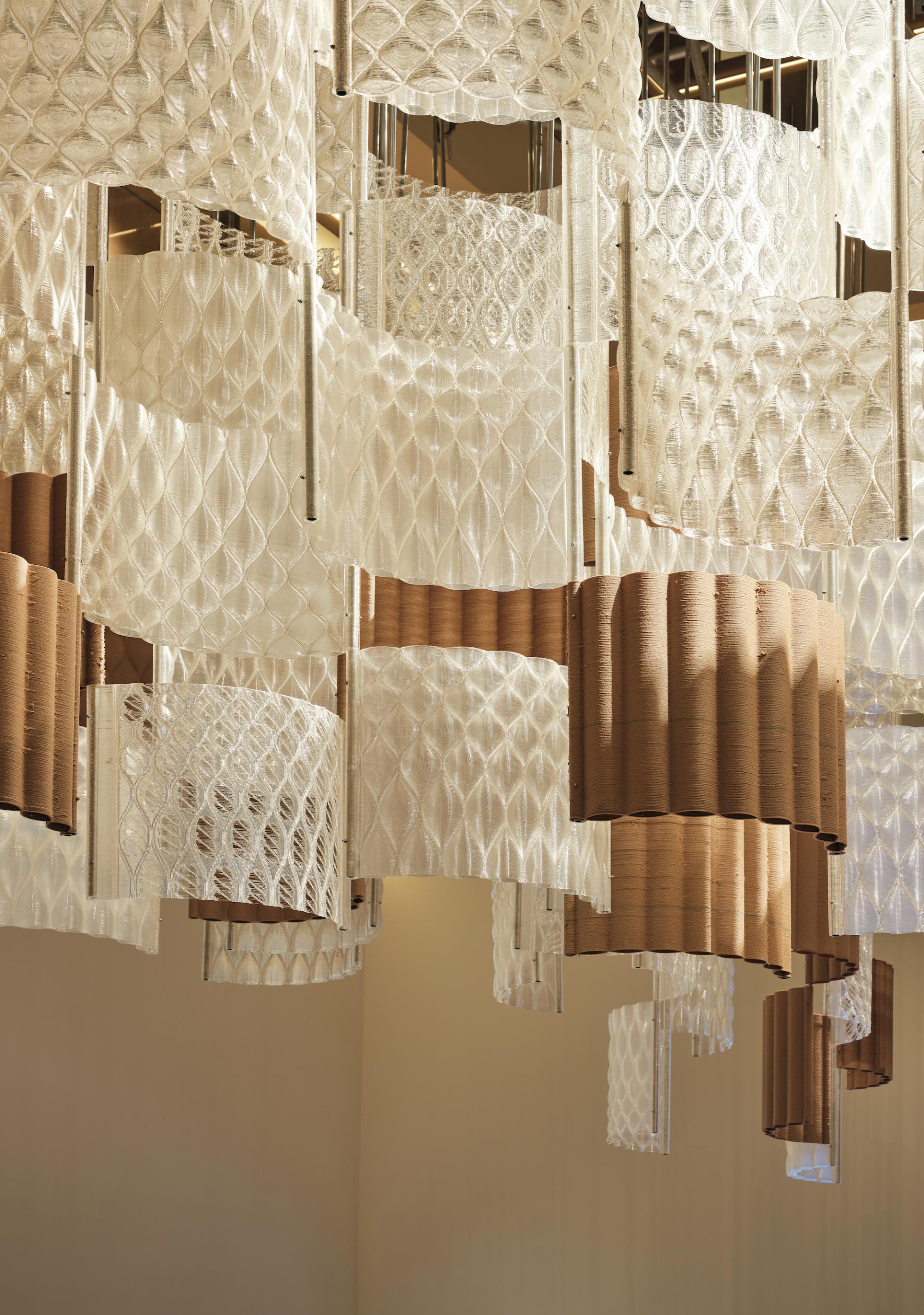 Contemporary light fixture showcasing intricate glass and textured materials, featured at the Design Museum during COP26.