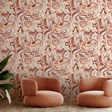 Stylish interior featuring Jan Erika's abstract wallpaper design and modern pink chairs, inspired by Trellick Tower.