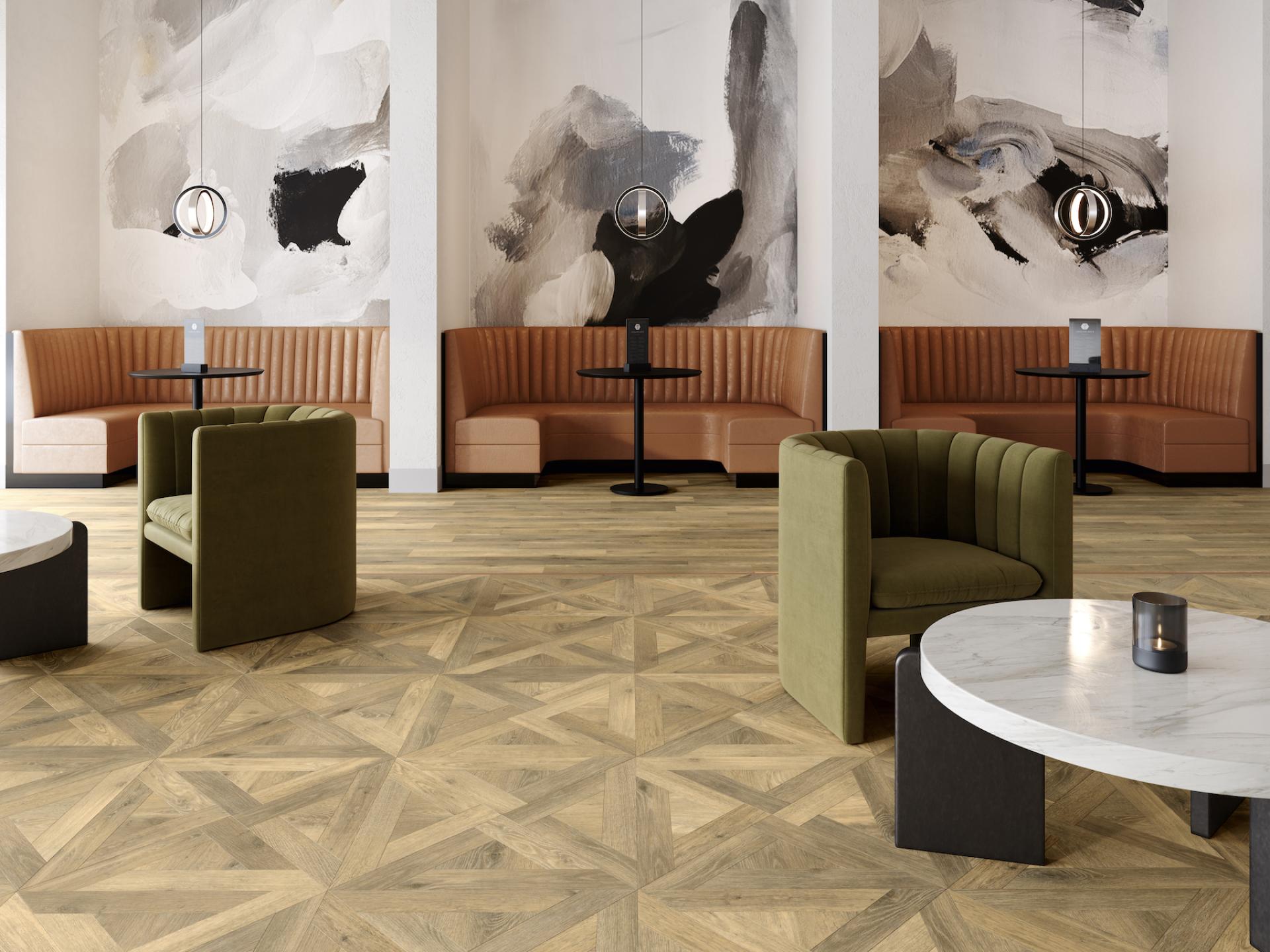 Stylish cafe interior featuring Amtico Bio lower carbon flooring, green and brown seating, with artistic wall decor.