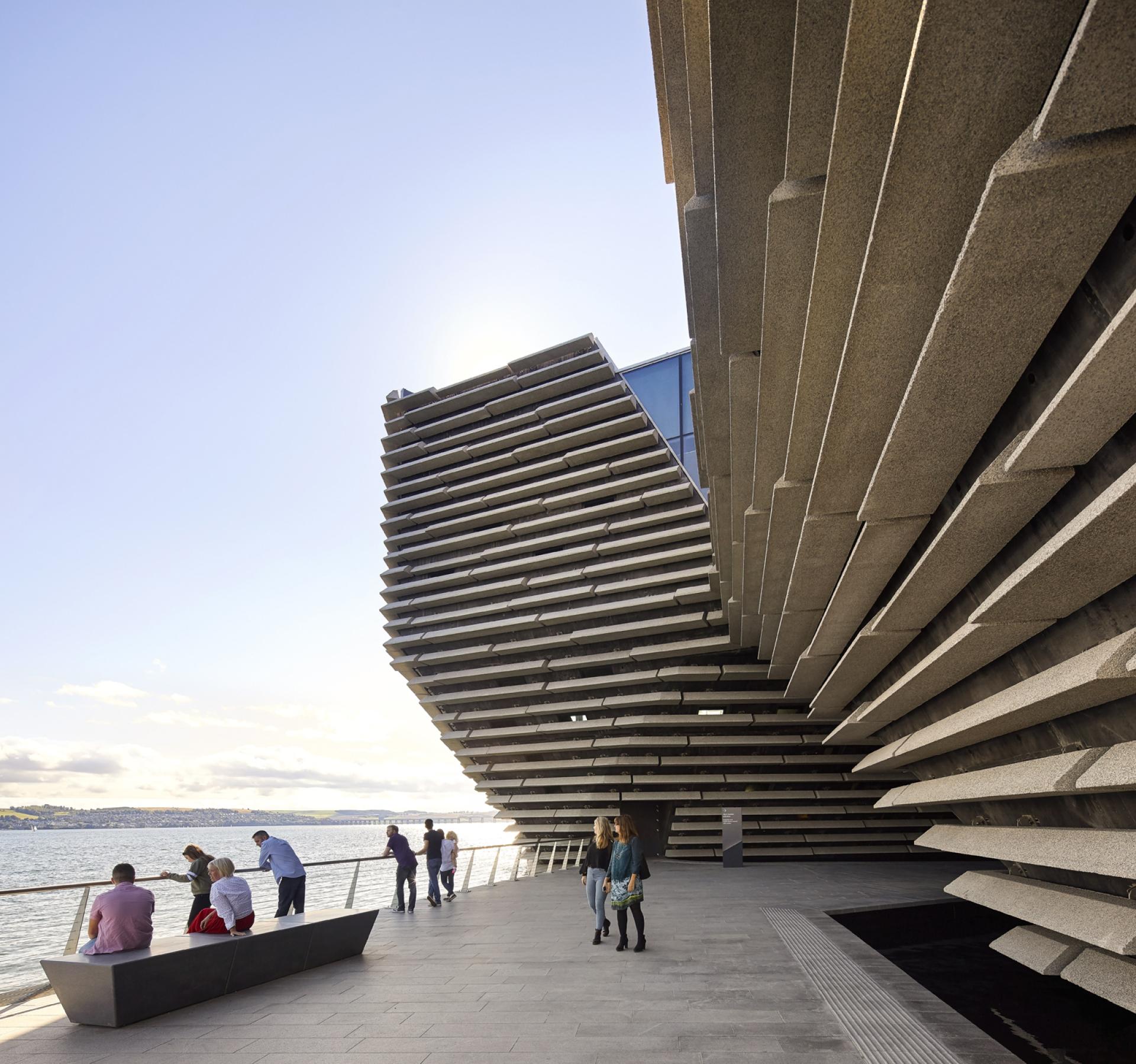 V&A Dundee’s striking, light-filled exterior features unique terraced designs, showcasing Kengo Kuma's innovative architectural vision by the waterfront.