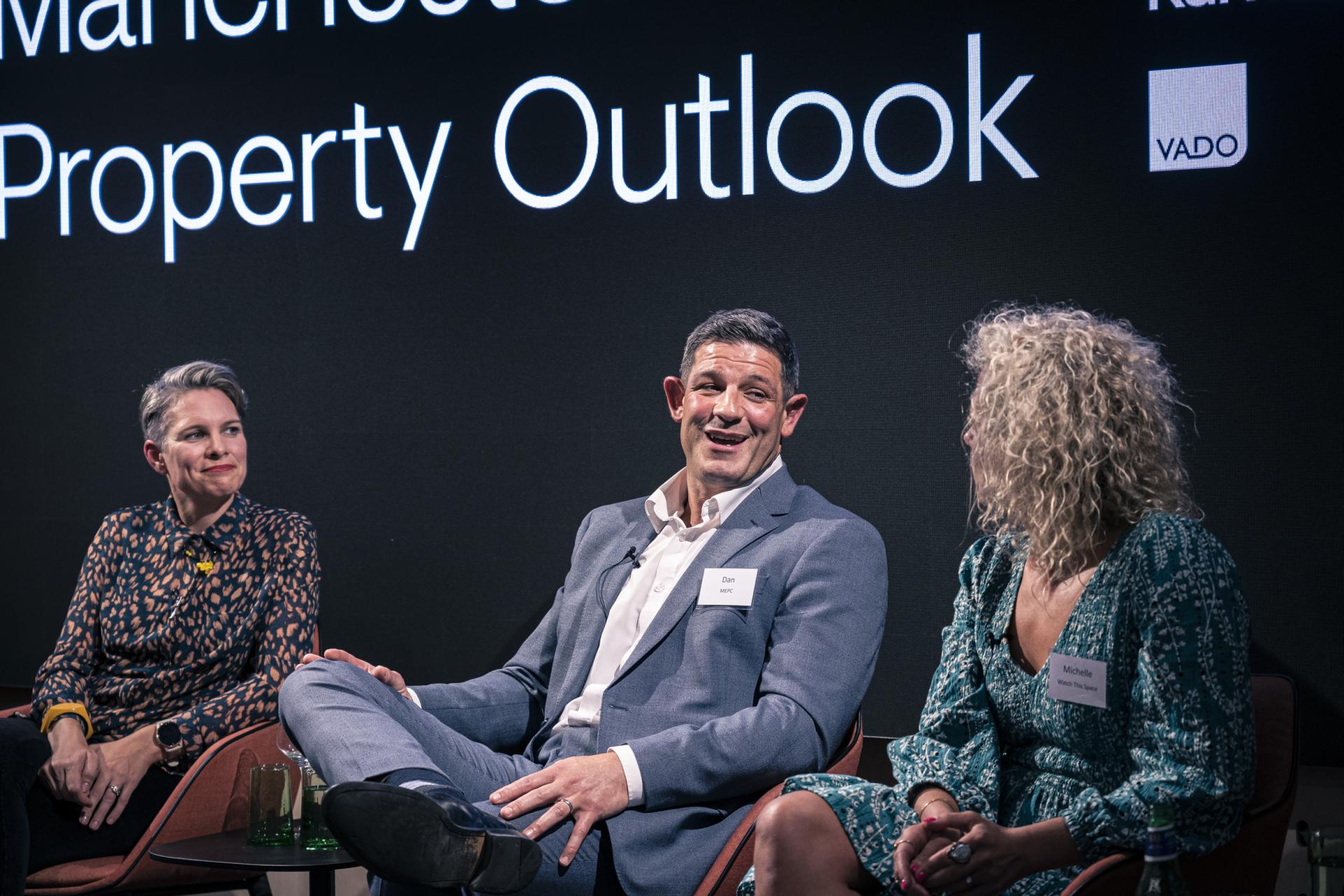 Panel discussion featuring experts at the Manchester Property Outlook seminar, sharing insights on the property market.