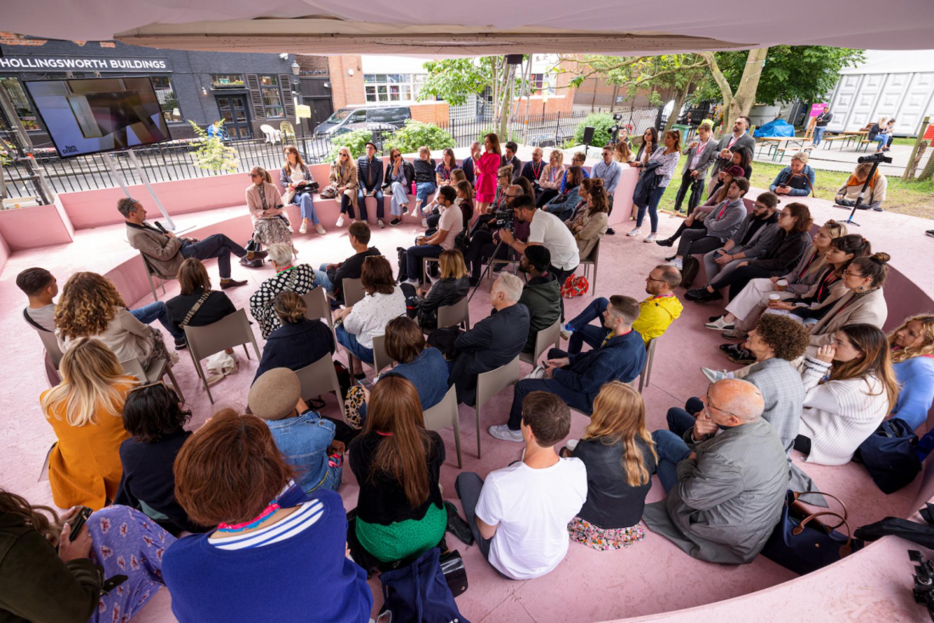 Group discussion during a creative event in 2022, capturing insights and trends in a collaborative setting.
