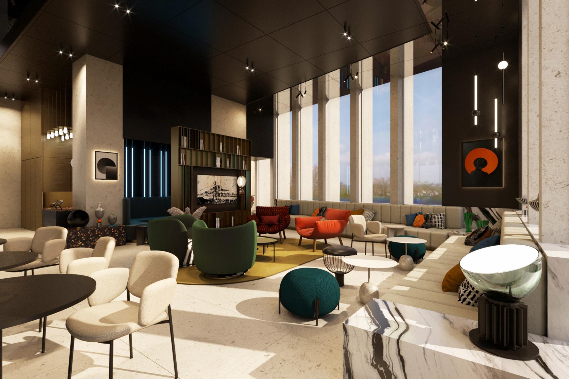 Modern interior design of the Tribe hotel lobby in Malta, featuring vibrant seating, artistic decor, and large windows.