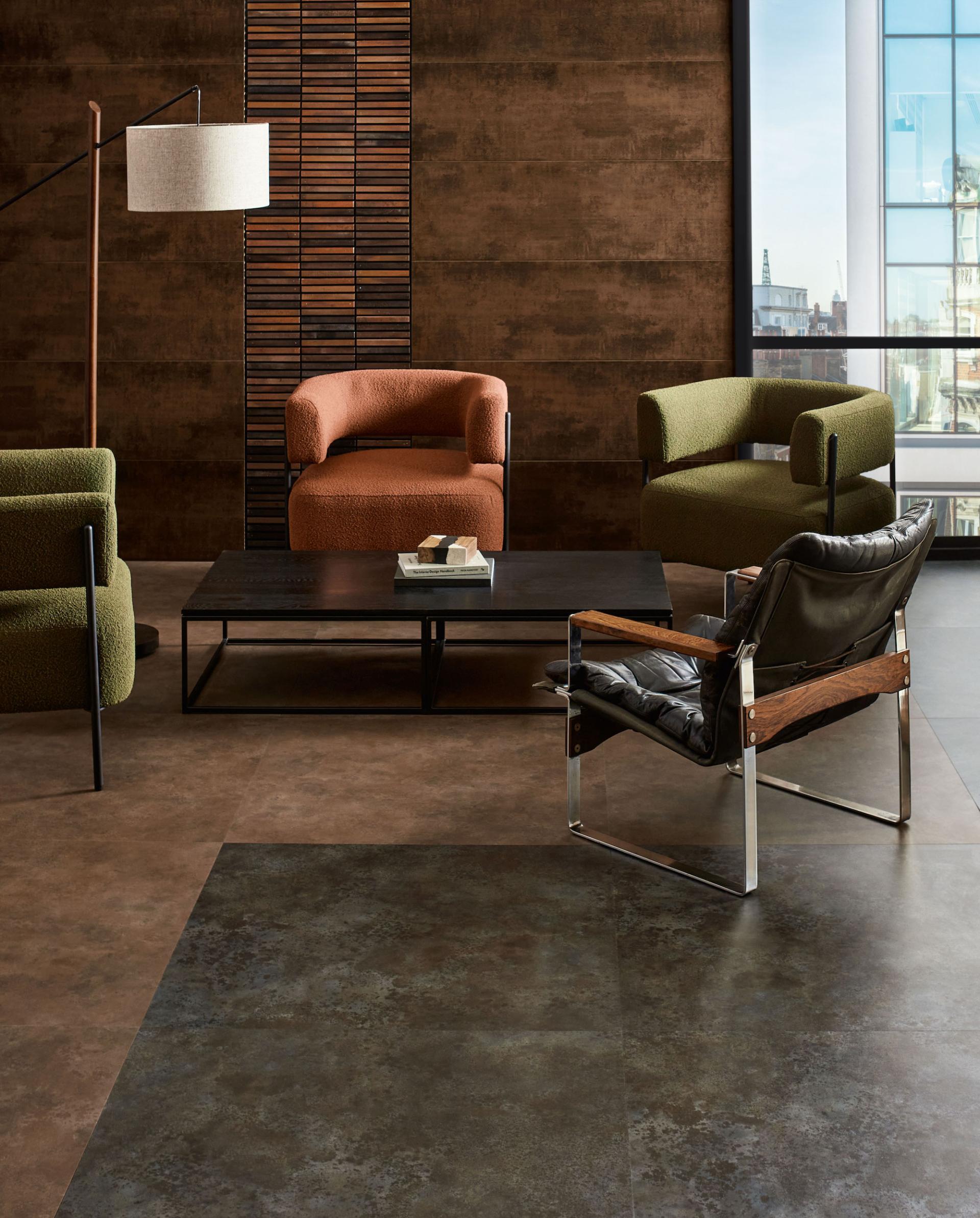 Modern commercial lounge area featuring textured flooring and colorful furniture, enhancing wellbeing through design and color.