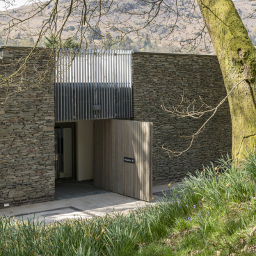 Newly designed entrance to The Museum at Wordsworth Grasmere, featuring modern architecture amid natural greenery.
