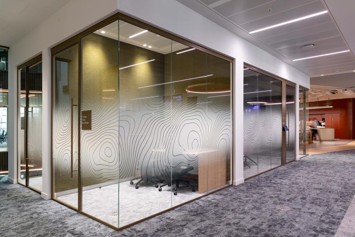 Radii supports tp bennett & Overbury with bespoke bronze framed glazed partitions at banking HQ in London.