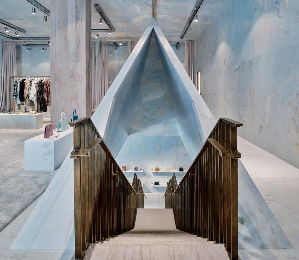 Céline's Miami store features blue marble designs and a striking pyramid structure, enhancing the shopping experience.