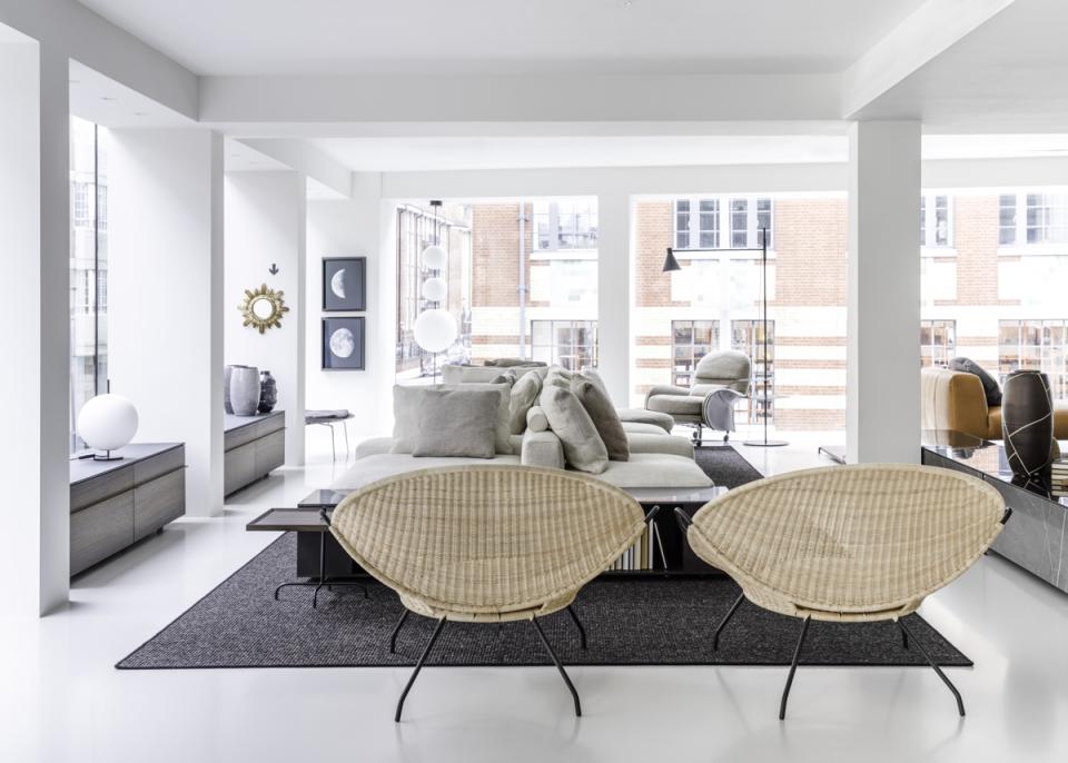 Stylish interior of De Padova's first UK flagship store featuring contemporary furniture and minimalist design elements.