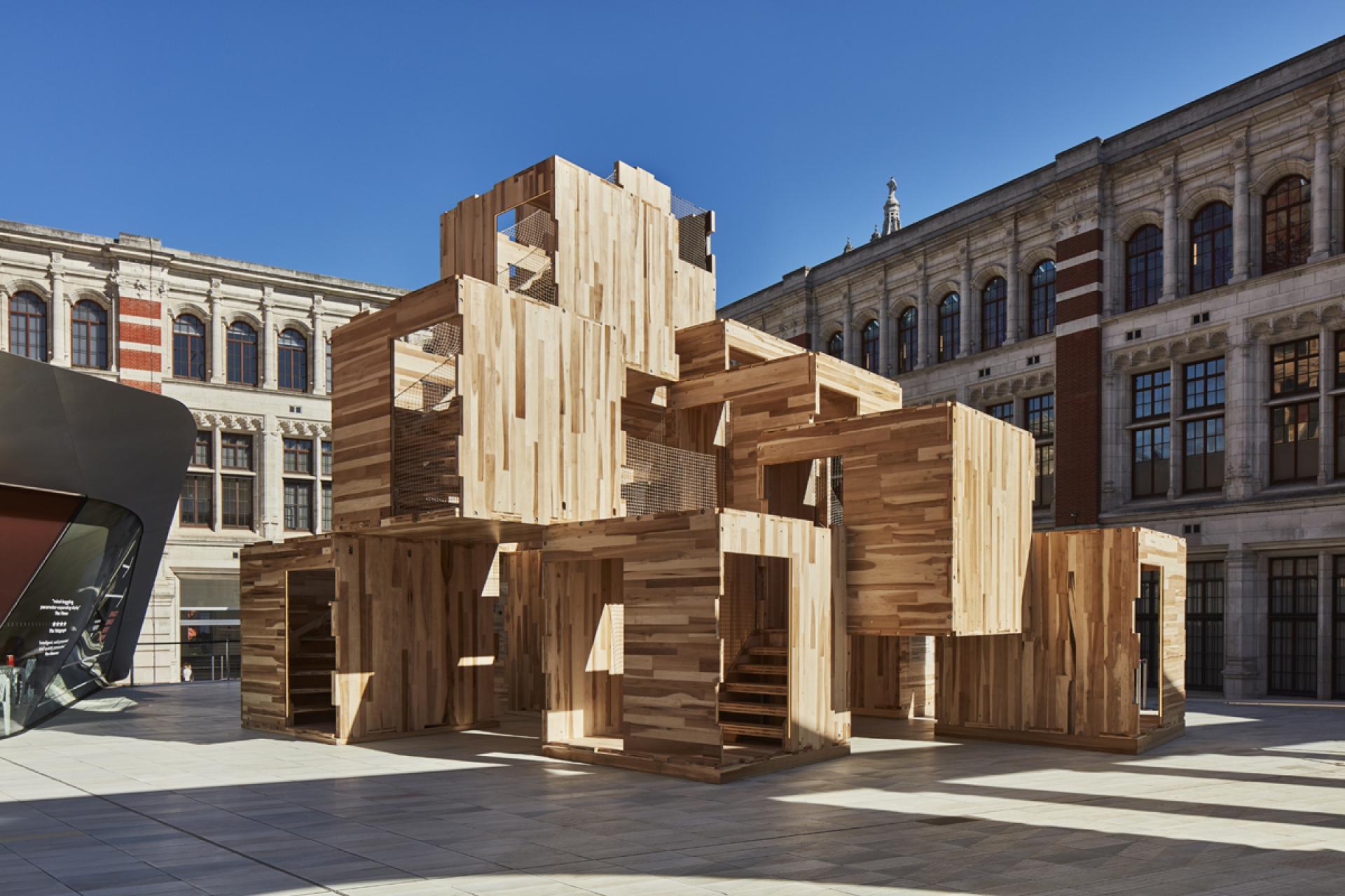 Carbon-neutral wooden pavilion made of American tulipwood showcasing innovative design to address the housing crisis.