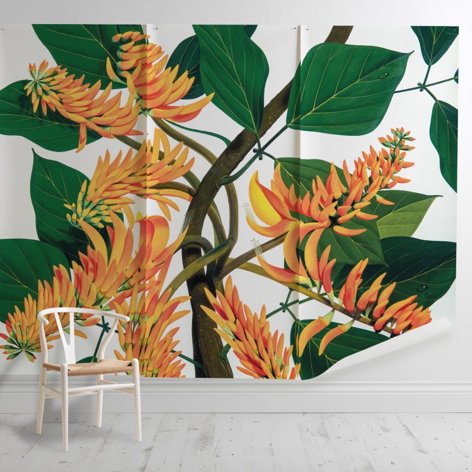 Vibrant botanical print featuring colorful flowers and lush green leaves, enhancing interior spaces with a natural aesthetic.