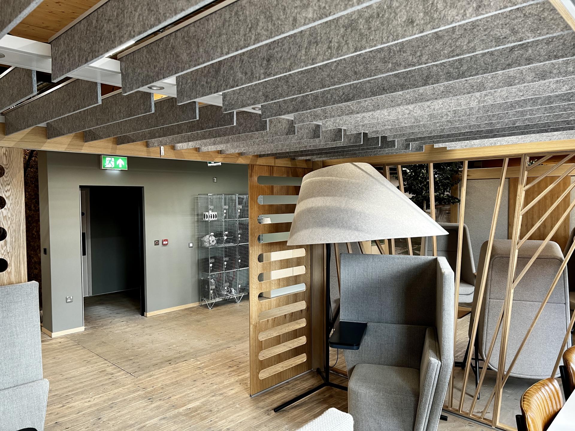 Modern interior of Leeds' first net zero carbon workspace featuring sustainable design elements and comfortable seating.