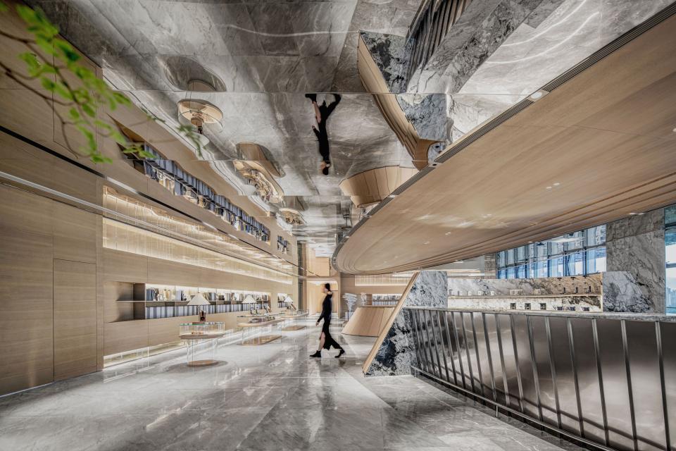 Sophisticated interior of Foshan Vanke Financial Centre, showcasing elegant design, marble surfaces, and stylish lighting by Karv One.