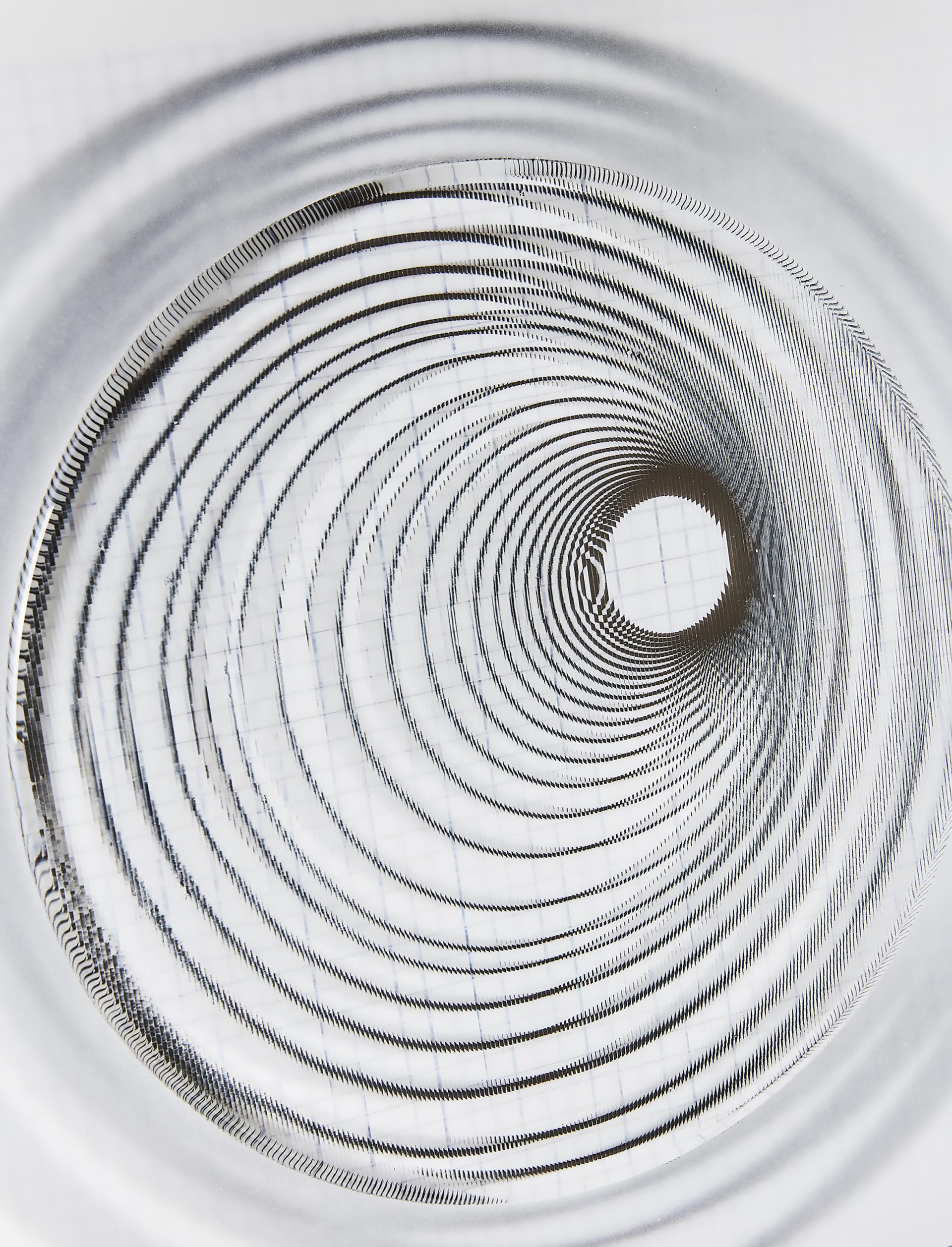 Intricate close-up of a design showcasing spiraled lines, emphasizing clarity and craftsmanship in contemporary maker culture.