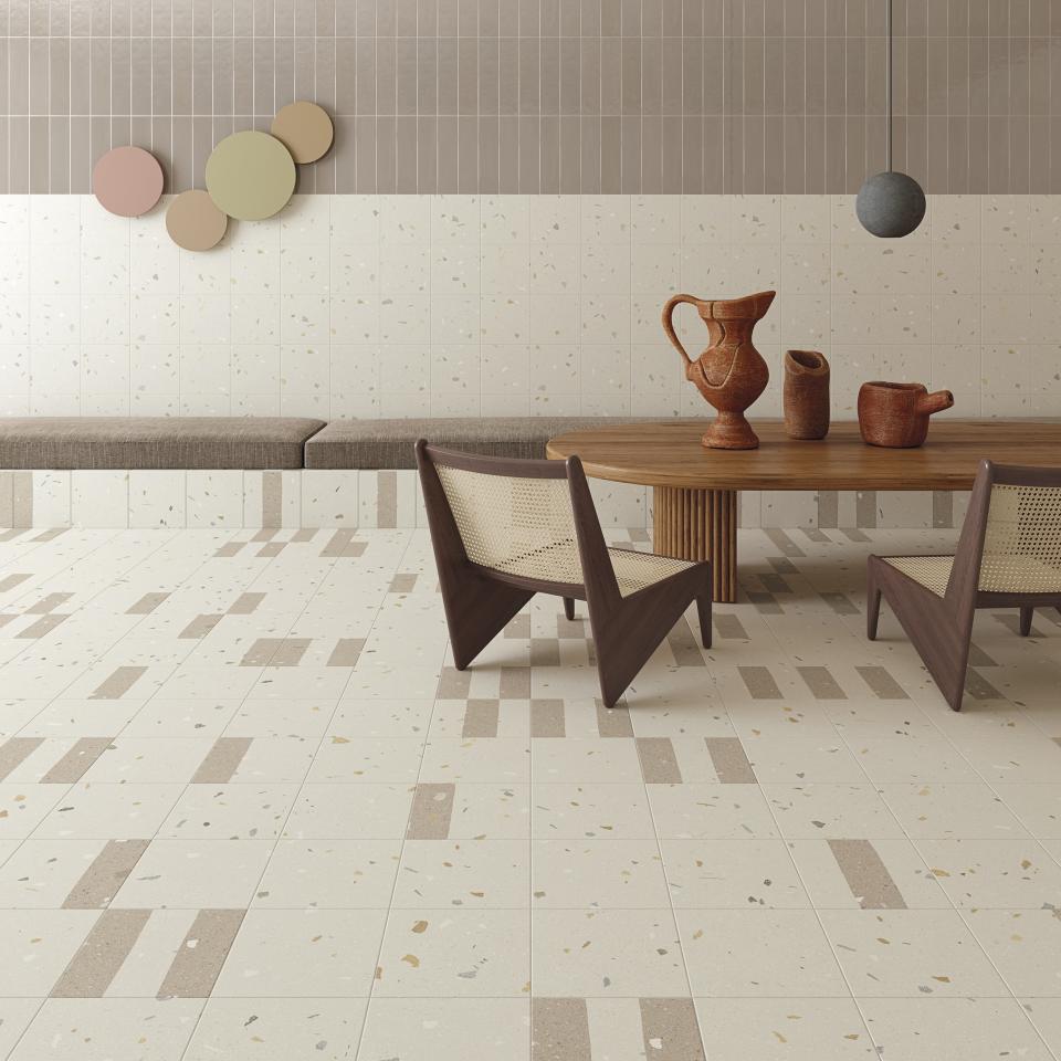 Modern ceramic tiles showcase a stylish dining area with natural textures, minimalistic decor, and earthy color palette inspired by Cevisama 2023.