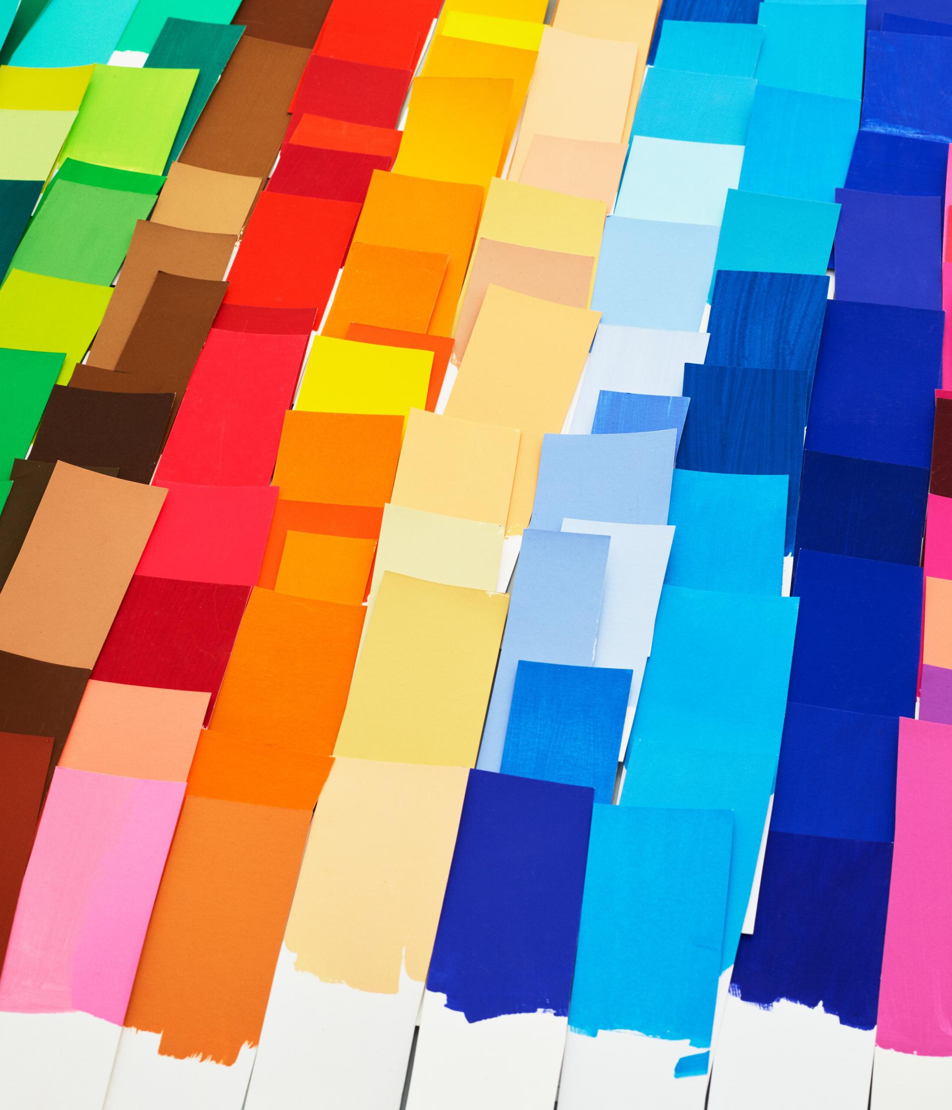 Colorful array of paint swatches showcasing the Divina Melange range, inspired by Finn Sködt's design at Kvadrat.