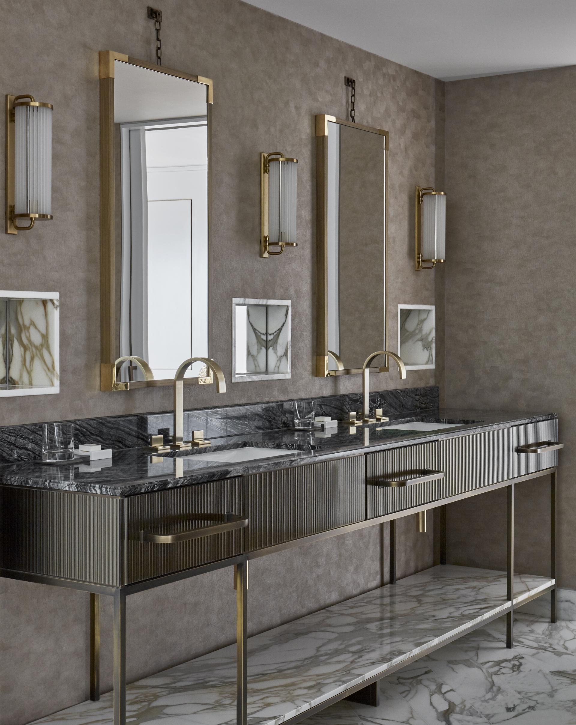 Elegant bathroom interior featuring a double vanity, marble accents, and stylish lighting at the Mandarin Oriental Penthouse.