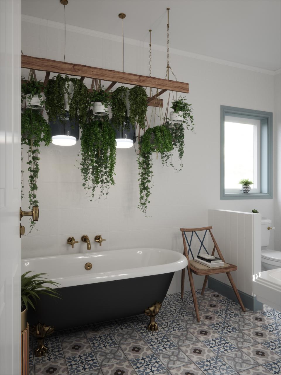 Elegant bathroom featuring a black freestanding tub, intricate floor tiles, hanging plants, and stylish fixtures from British Ceramic Tile's V&A collection.