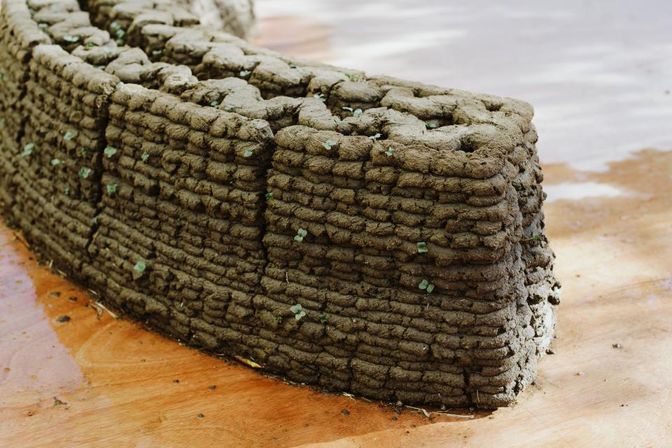 3D-printed building structure made from organic materials, showcasing innovative construction techniques at Jerusalem Design Week 2022.
