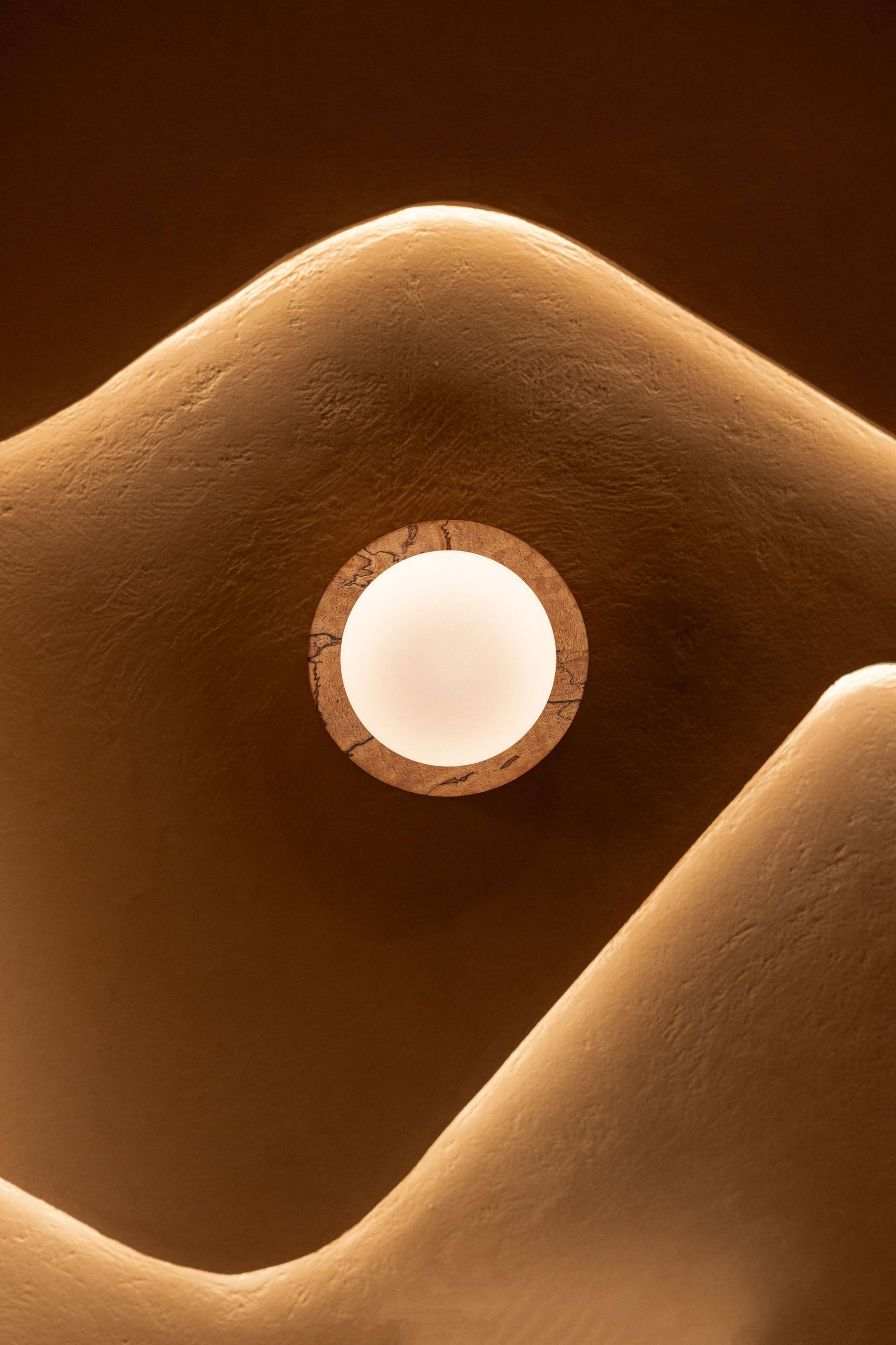 DLSM Studio transforms Qima Café’s second location in the heart of London's Covent Garden.