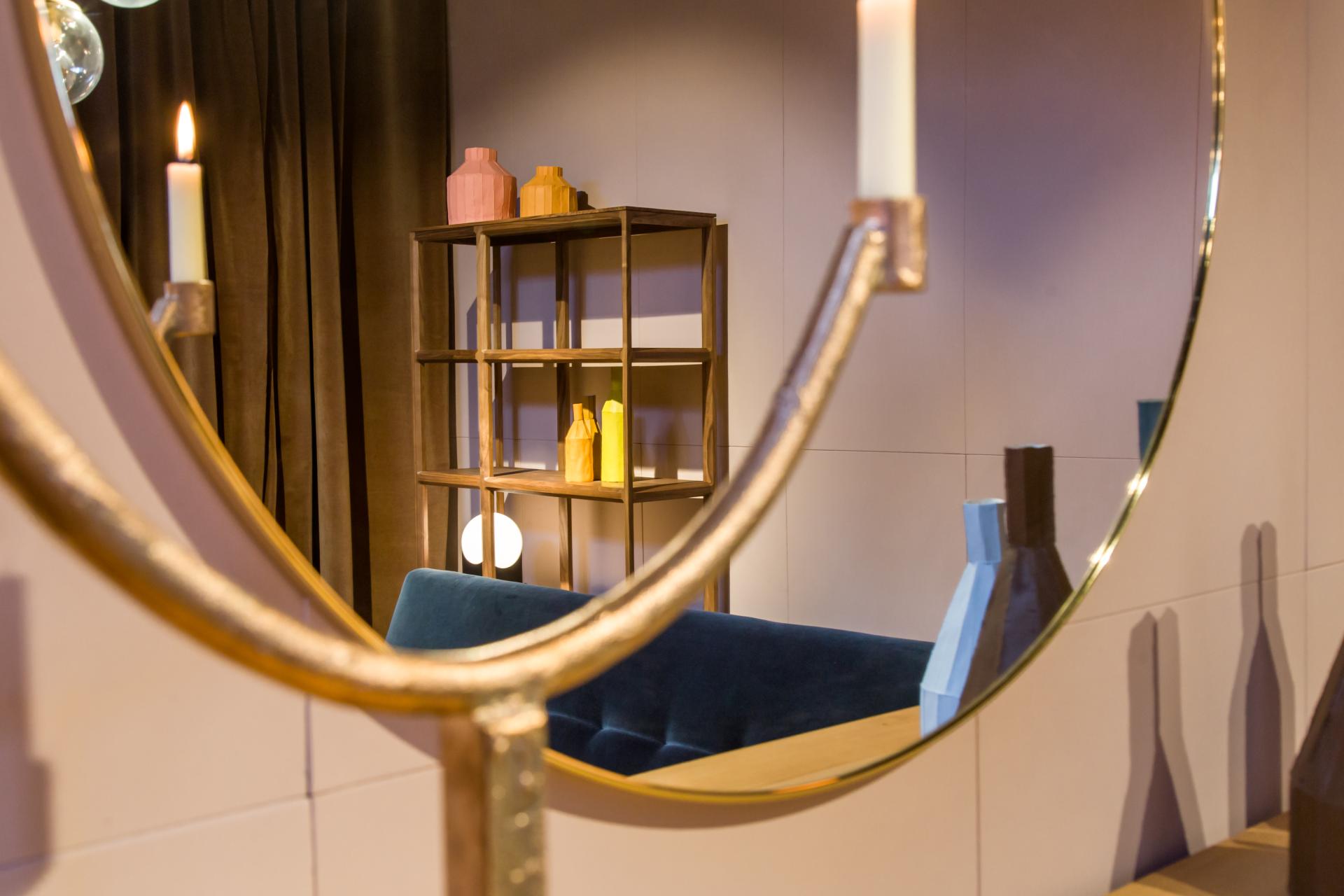 Stylish interior view of SCP's showroom featuring colorful decor, soft furnishings, and artistic shelving on Pimlico Road.