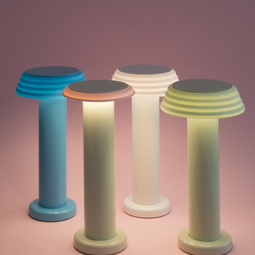 Colorful, modern lamps from the SowdenLight SHADES collection, showcasing diverse configurations against a soft pink background.
