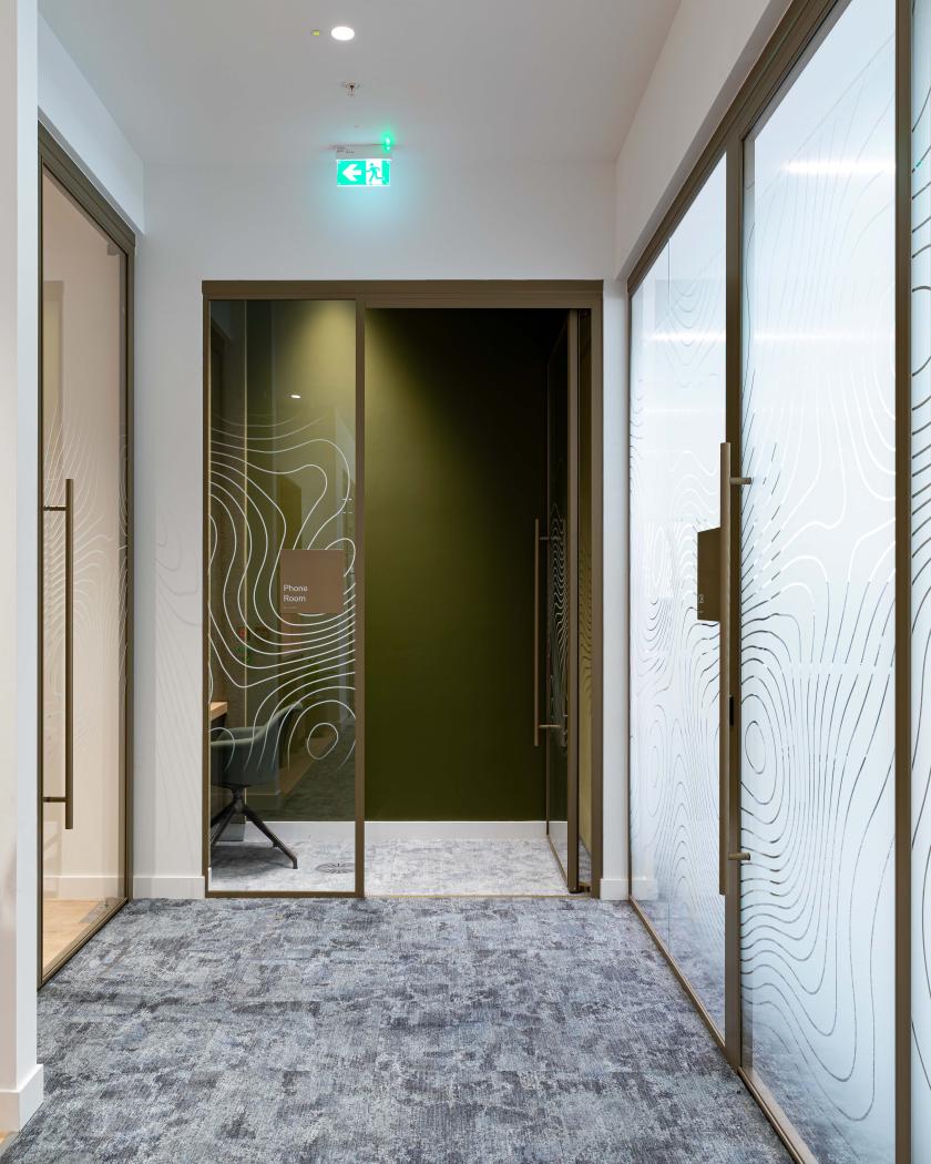 Radii supports tp bennett & Overbury with bespoke bronze framed glazed partitions at banking HQ in London.